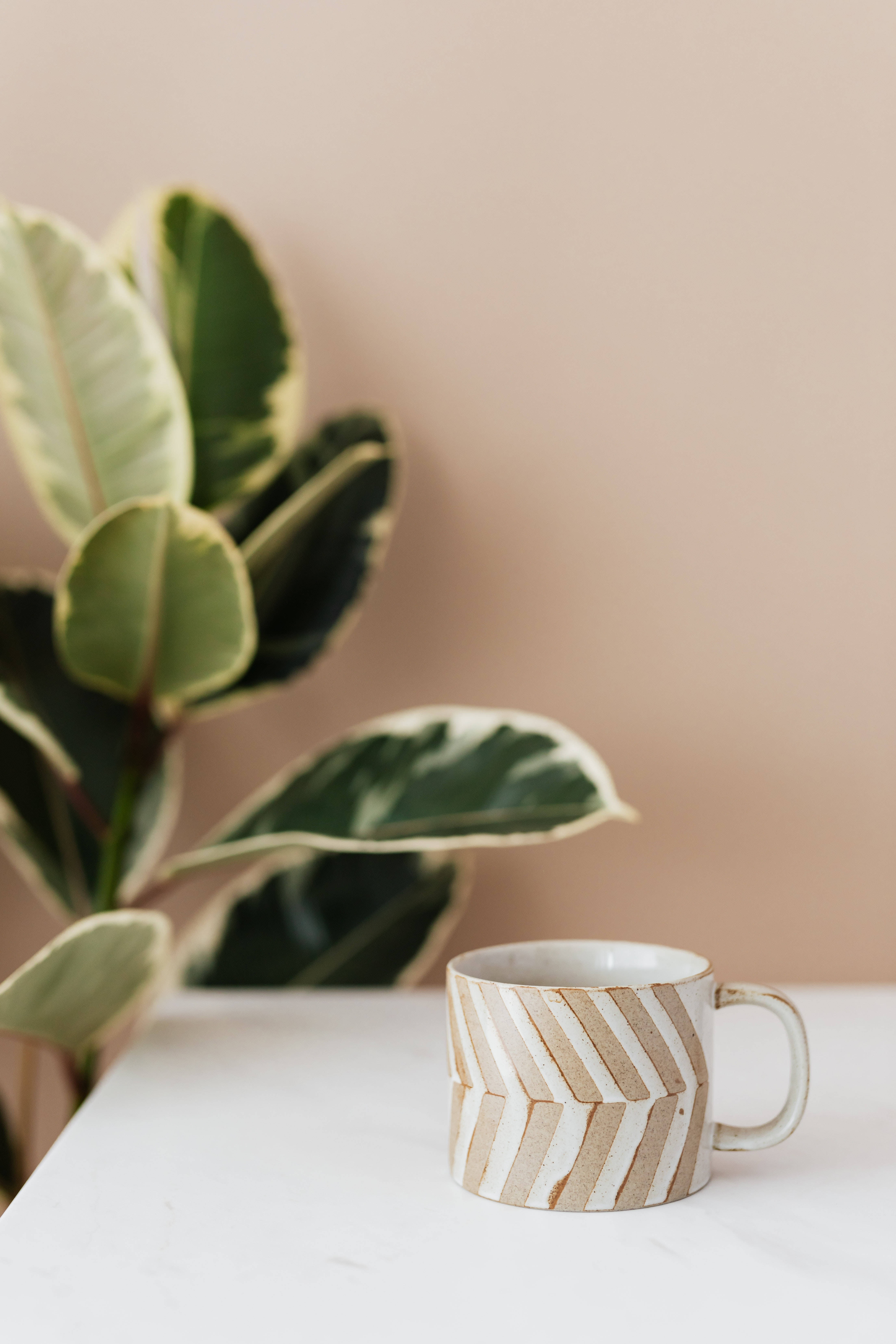 ceramic mug, beige and white chevron pattern, white table, 5K Phone Wallpaper