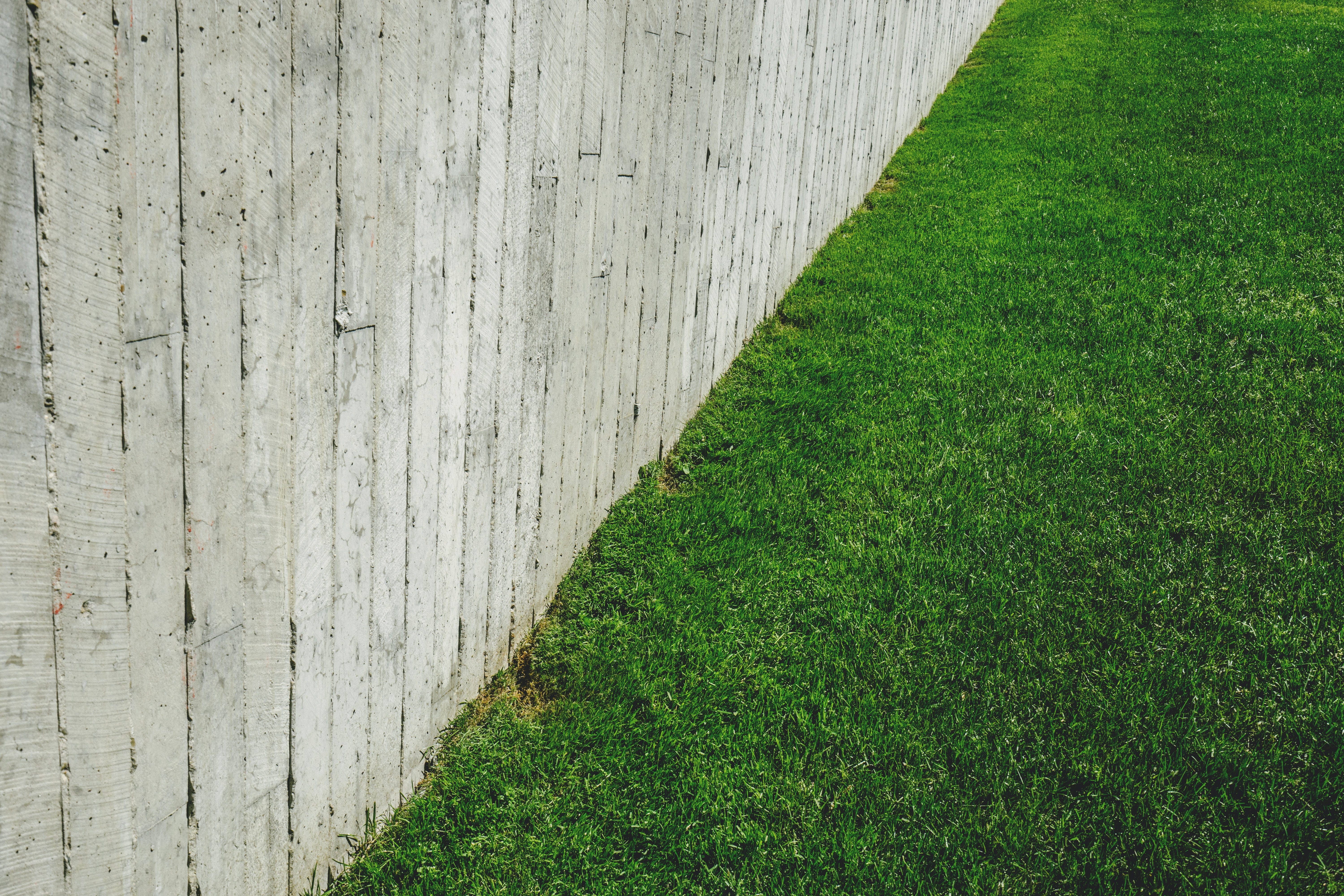 green minimalist, weathered white wooden fence planks, lush green grass, 5K Desktop Wallpaper