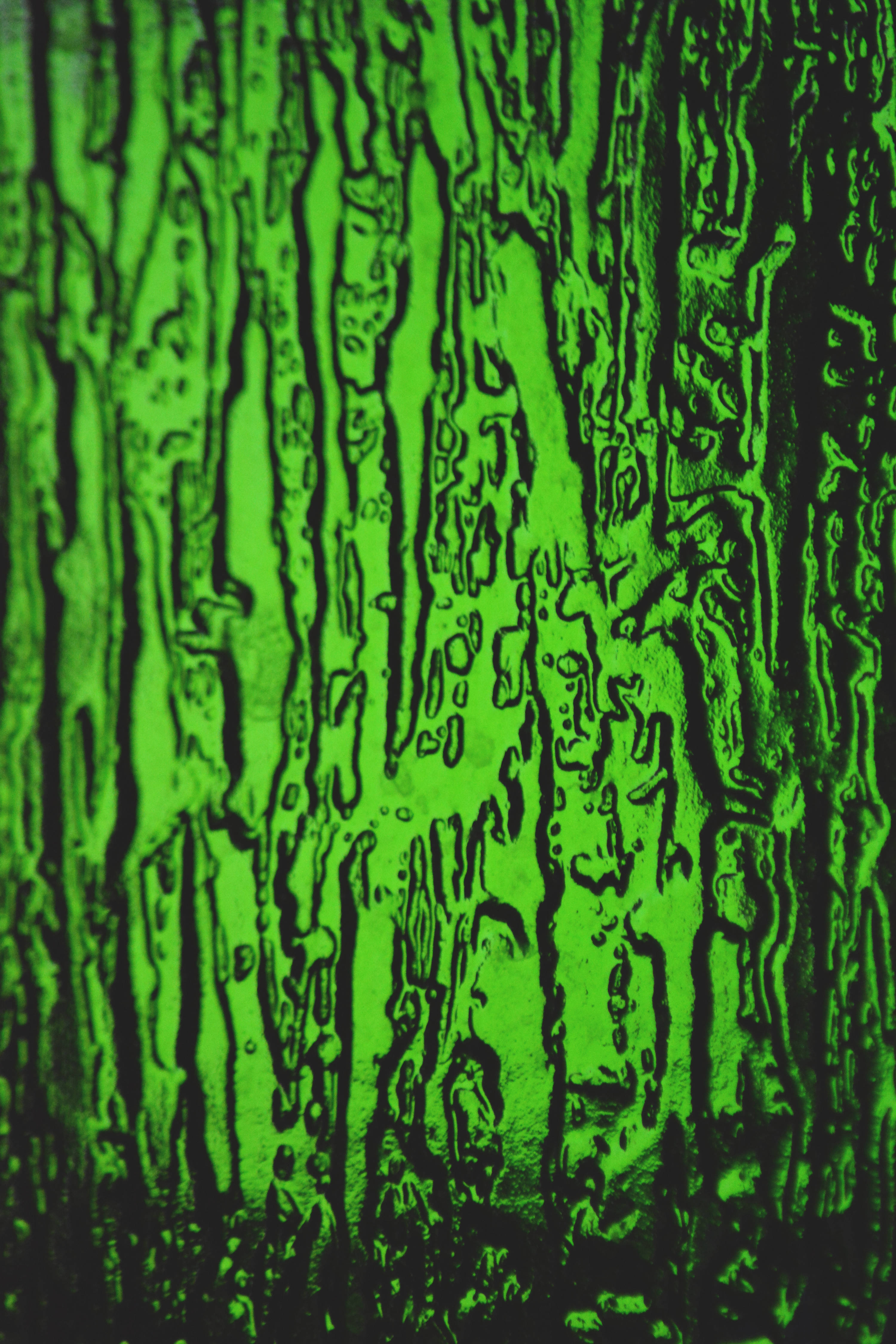 neon green, water droplets, dark glass surface, 4K Phone Wallpaper