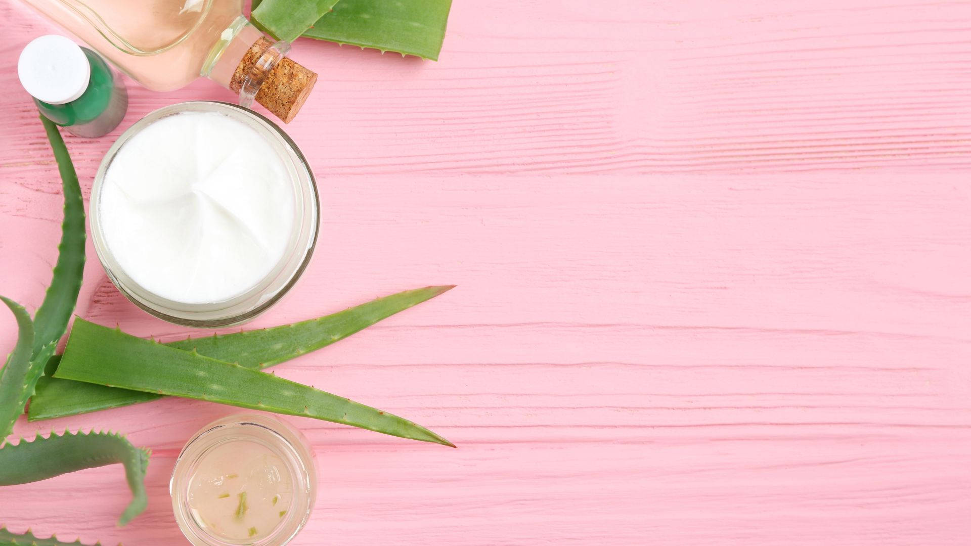 aloe vera gel jars, fresh leaves, soft pink wooden surface, Full HD Desktop Wallpaper