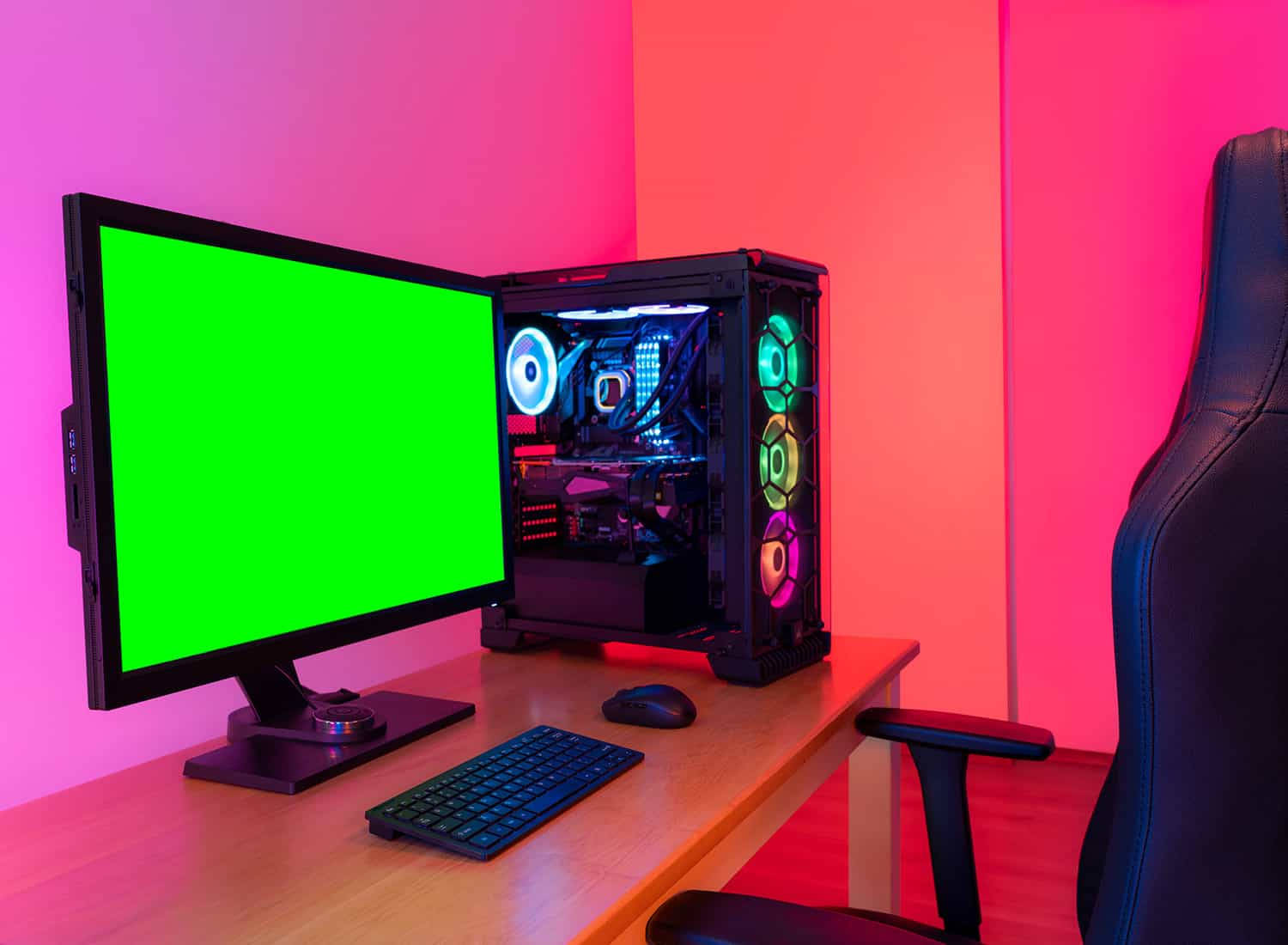 green screen monitor, RGB-lit PC tower, pink and orange ambient light, HD Desktop Wallpaper