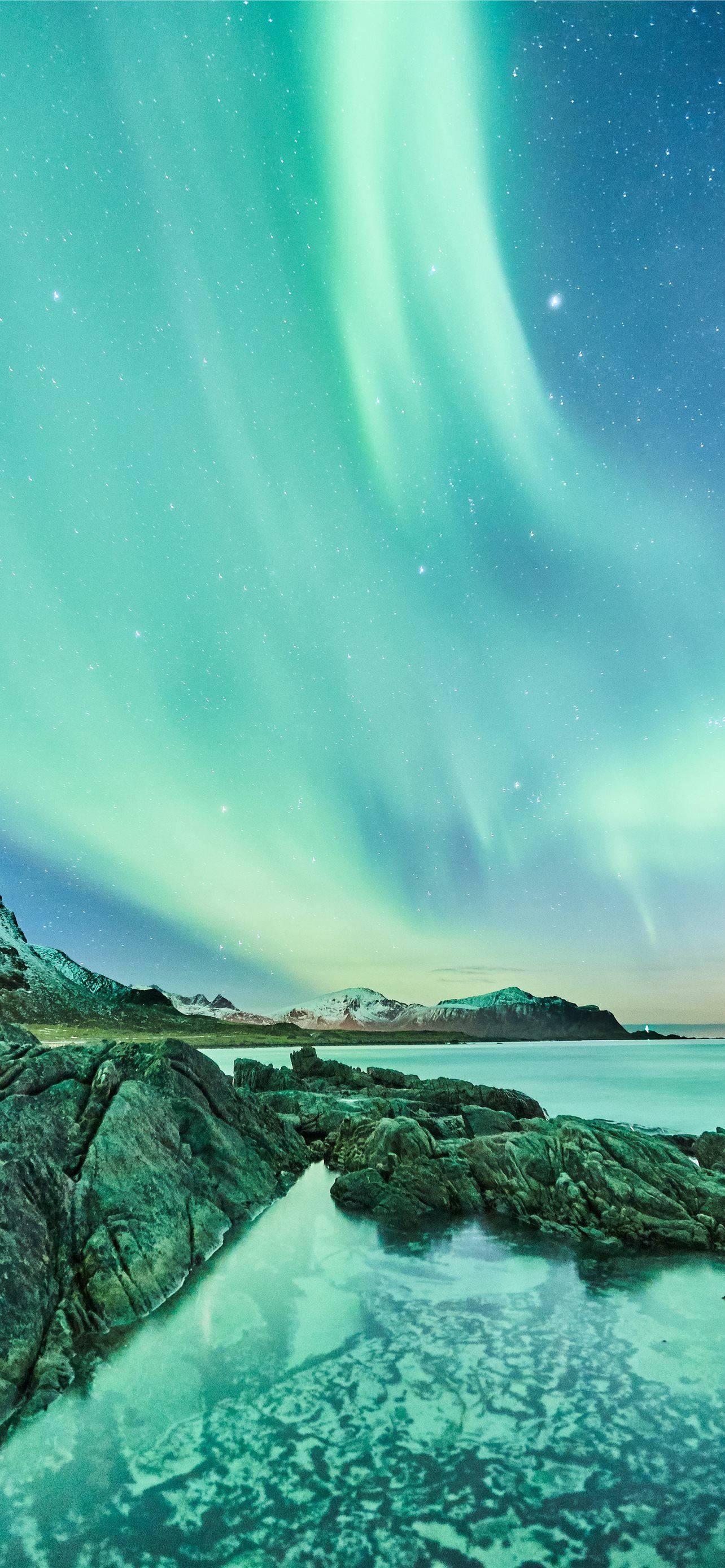Green Aurora Borealis, Starry Night Sky, Rocky Coastal Landscape, 2K Phone Wallpaper