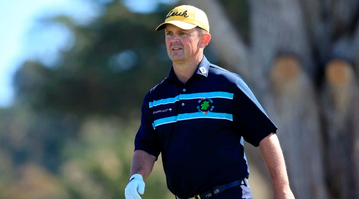 Greg Chalmers, navy blue shirt, yellow cap, SD Desktop Wallpaper