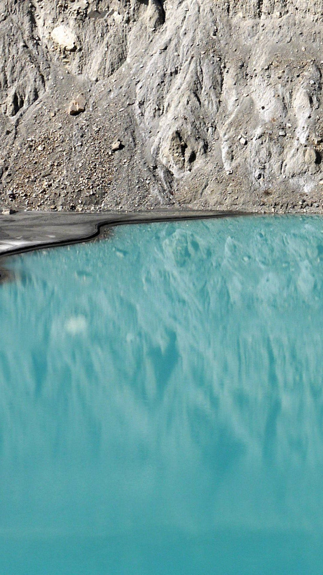 Grey iPhone, turquoise pool, rugged gray rock formations, Full HD Phone Wallpaper