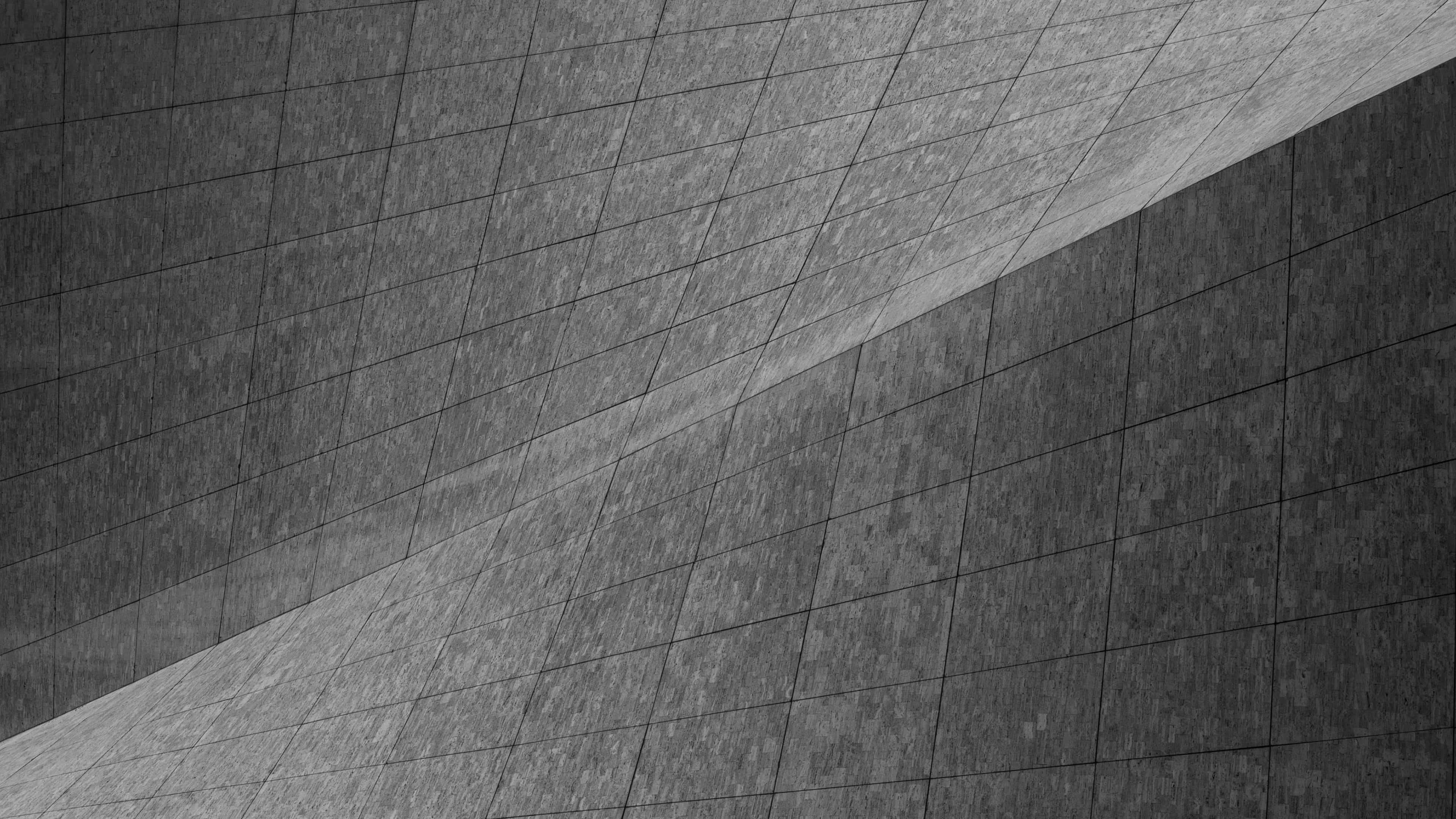 black and white photo, diagonally angled tiled wall, textured grout lines, 4K Desktop Wallpaper