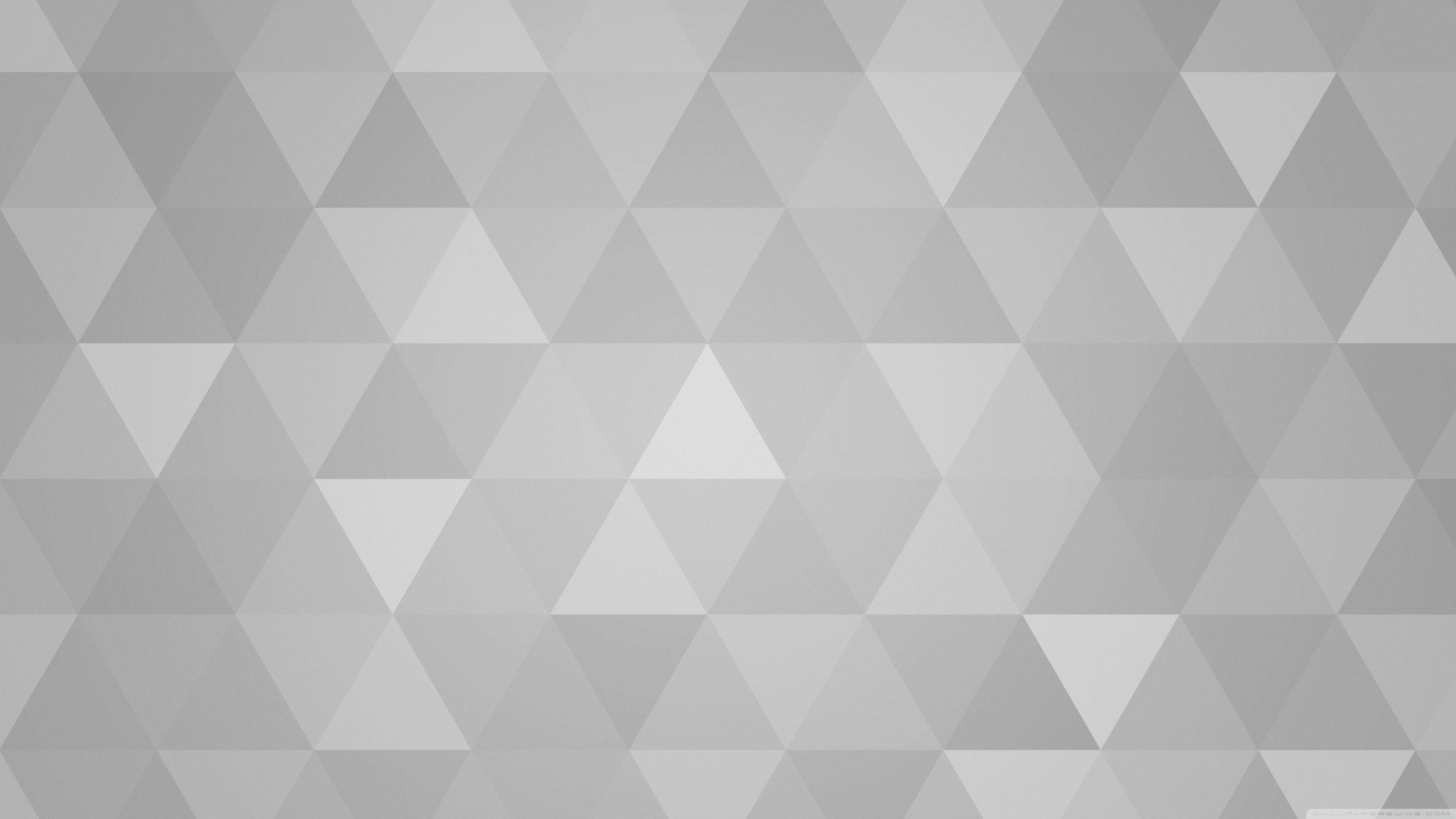 light grey background, interlocking gray triangles, subtle geometric pattern, 4K Desktop Wallpaper