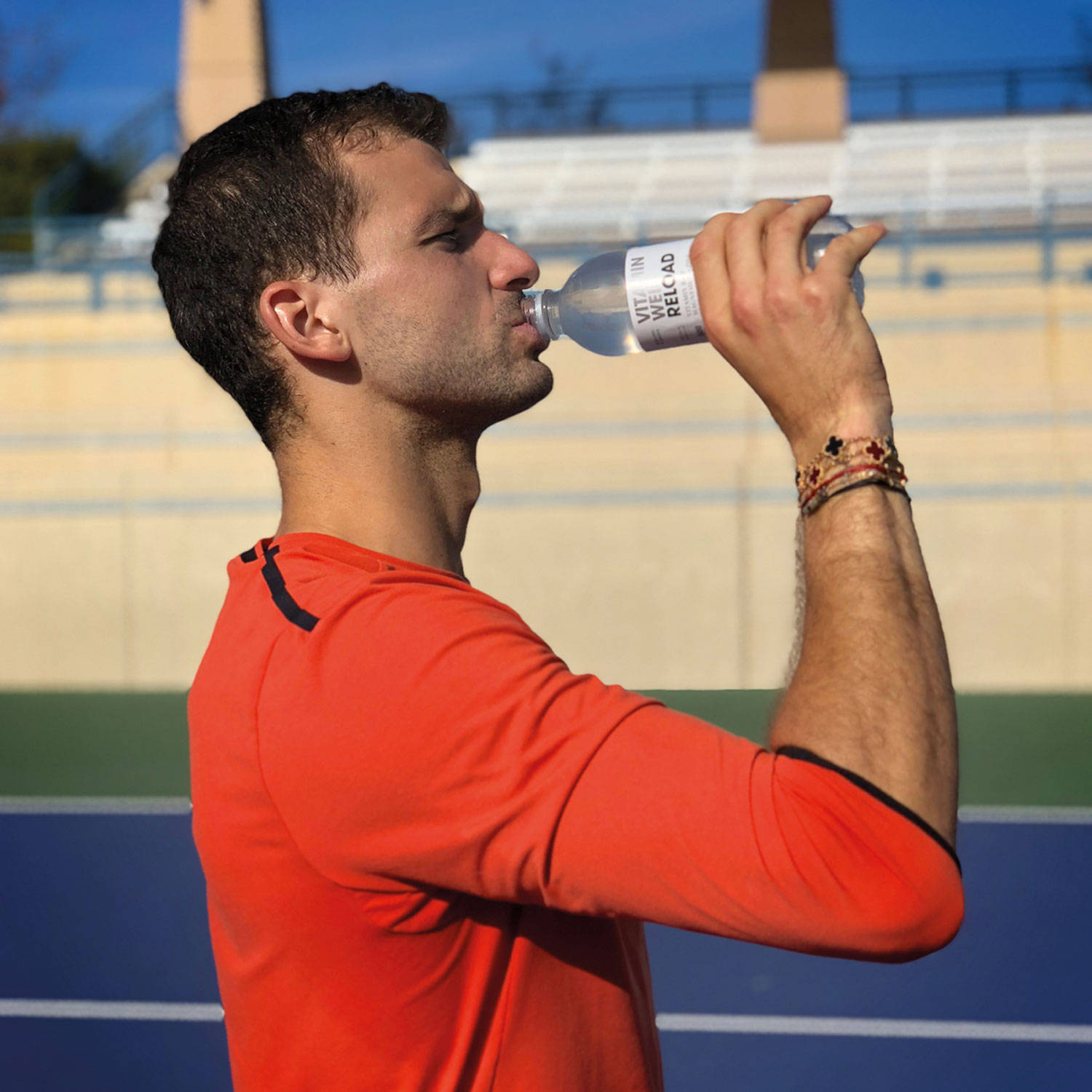 Grigor Dimitrov, orange shirt, water bottle, HD Desktop Wallpaper