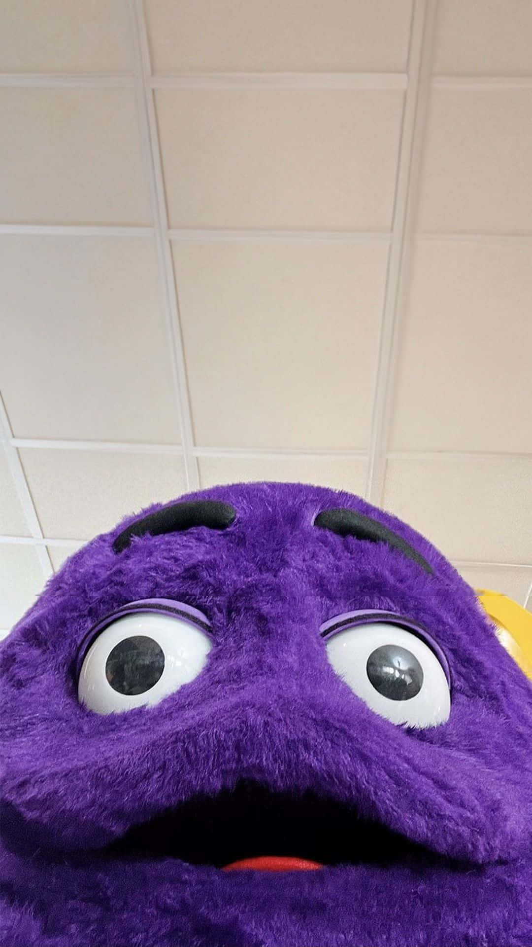 purple mascot, grimacing, upward view, Full HD Phone Wallpaper