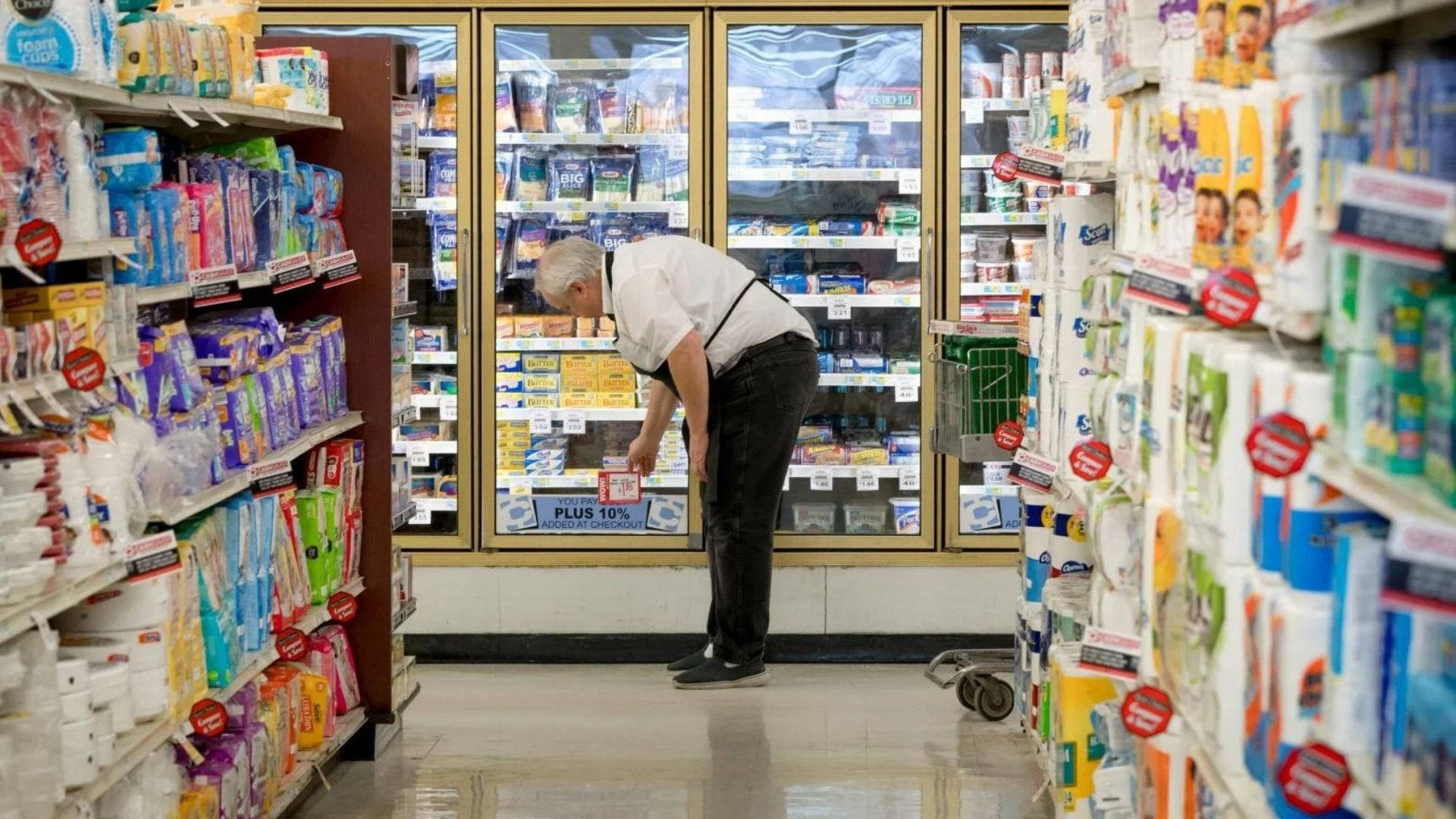 elderly man, brightly lit supermarket aisle, colorful packaged goods, Full HD Desktop Wallpaper