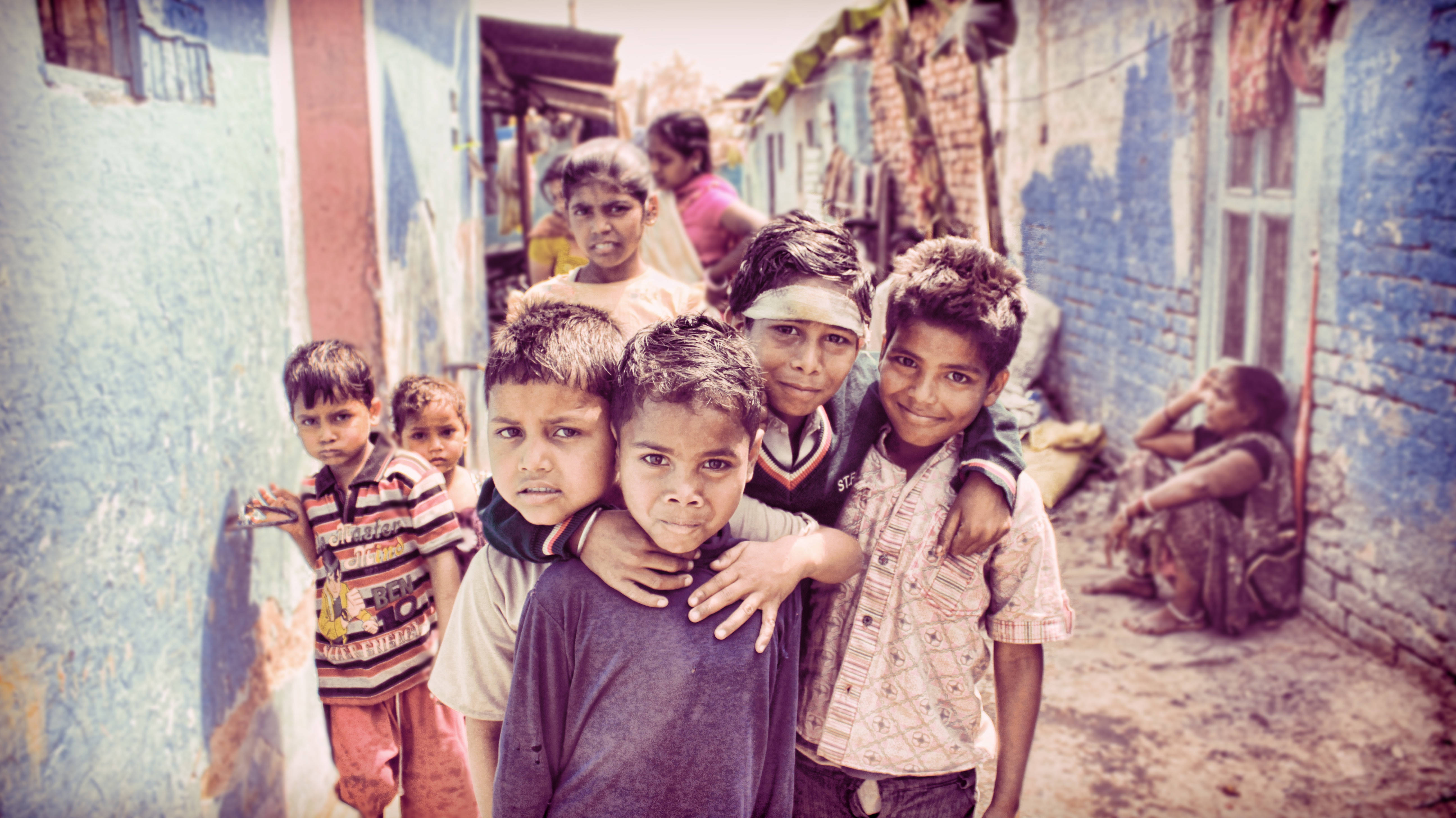 Group Of Boys In Village, narrow alleyway, faded blue walls, 5K Desktop Wallpaper