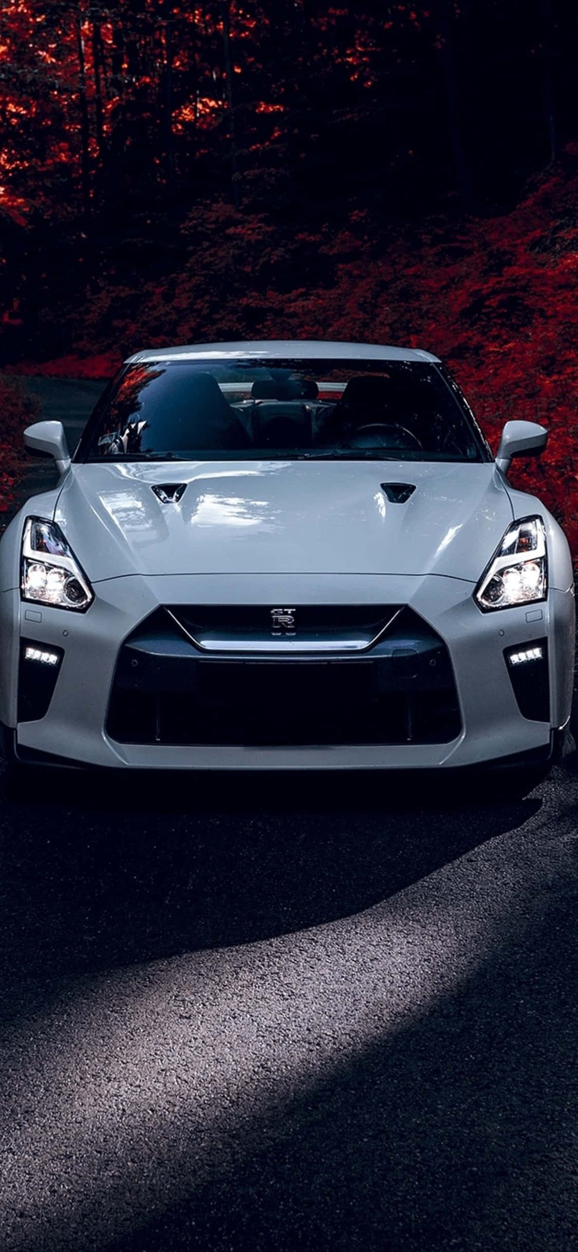 GTR iPhone, sleek silver sports car, dramatic lighting, Full HD Phone Wallpaper