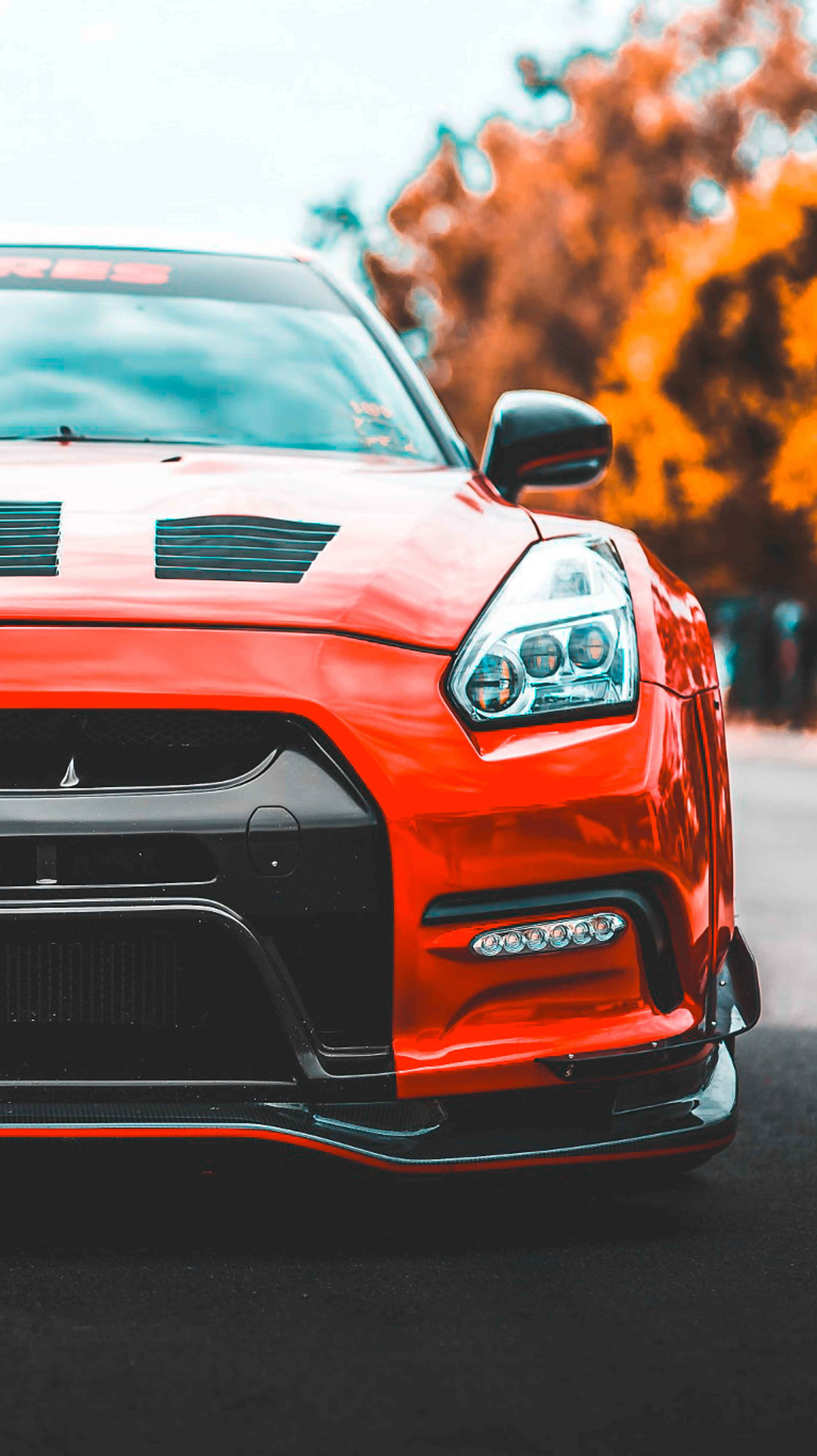 Gtr iPhone, vibrant red, black accents, 5K Phone Wallpaper