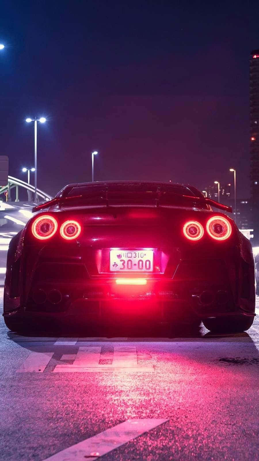 GTR iPhone, black sports car, glowing red circular taillights, HD Phone Wallpaper