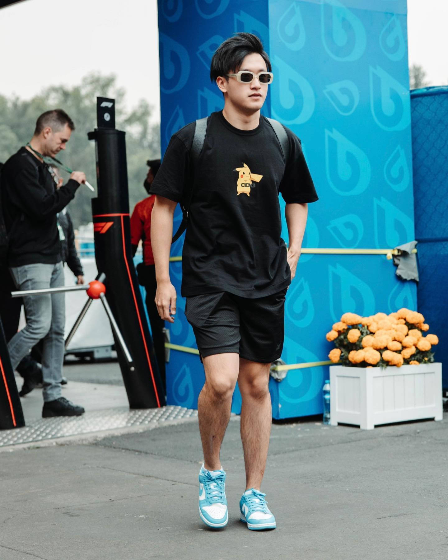 Guanyu Zhou, black Pikachu t-shirt, bright blue sneakers, HD Phone Wallpaper