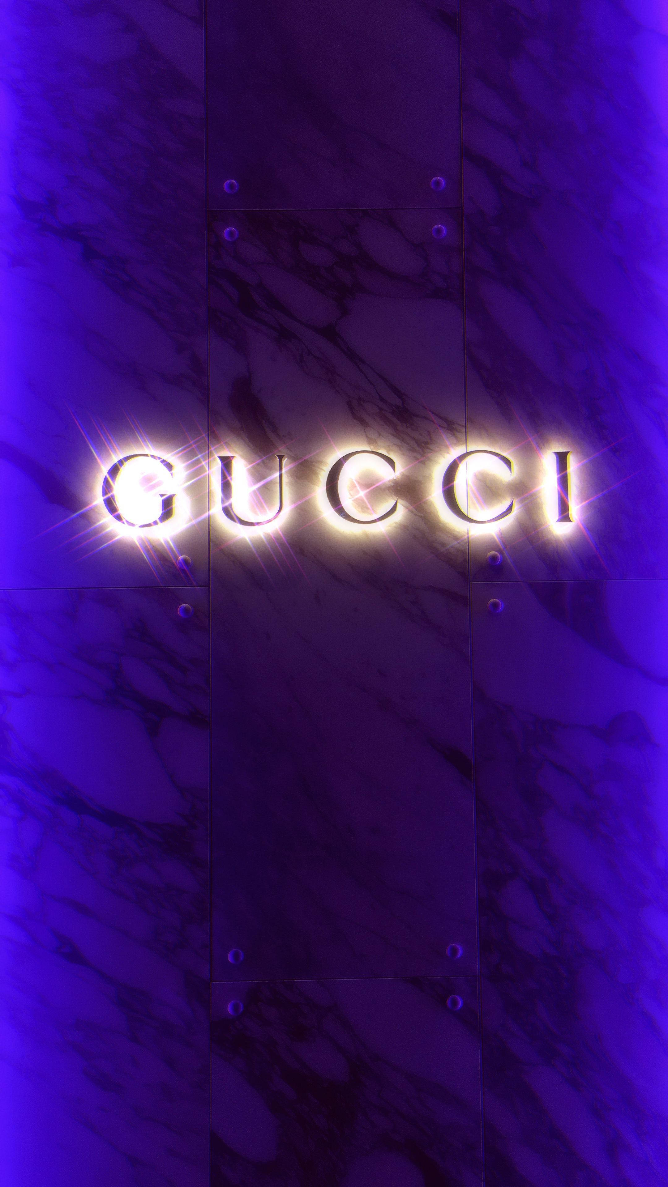 Gucci, glowing Gucci sign, deep purple marble tiled wall, 4K Phone Wallpaper