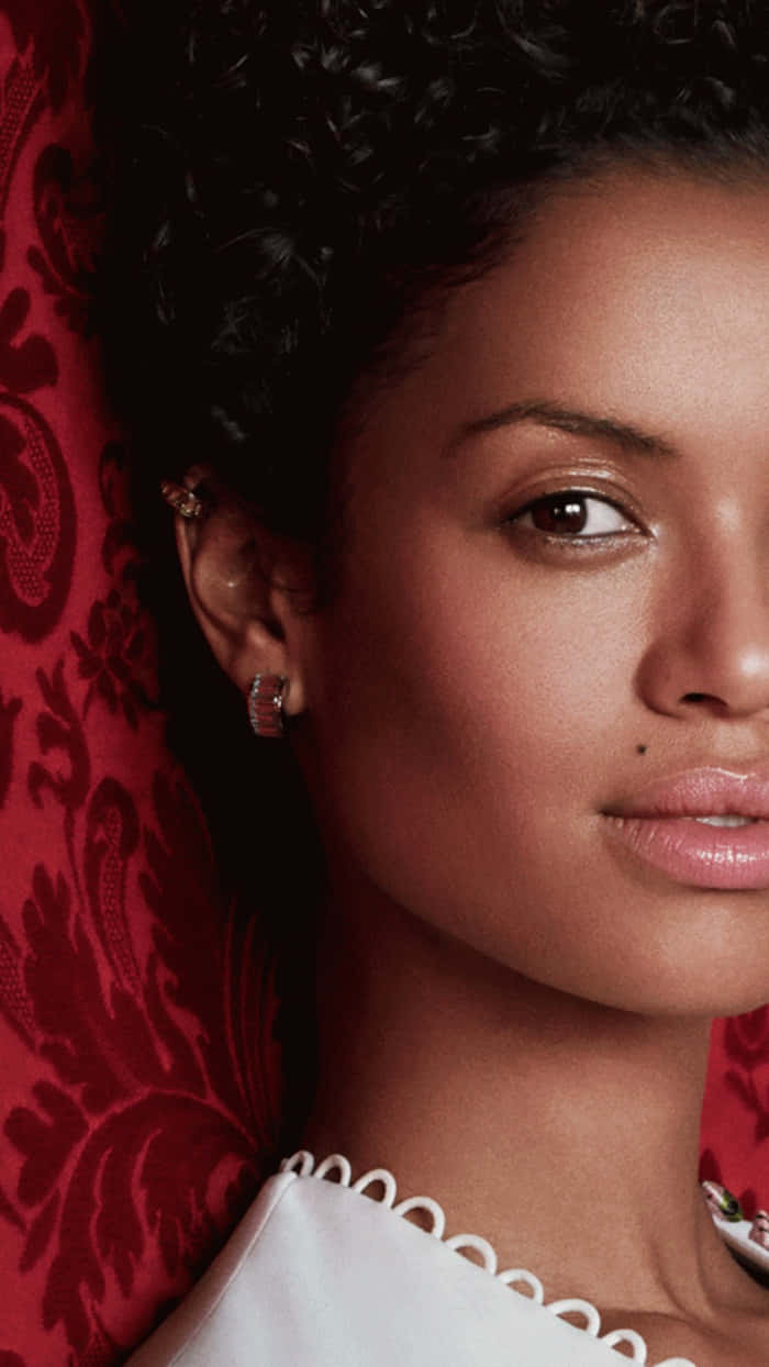 Gugu Mbatha-Raw, dark curly hair, subtle jewelry, SD Phone Wallpaper
