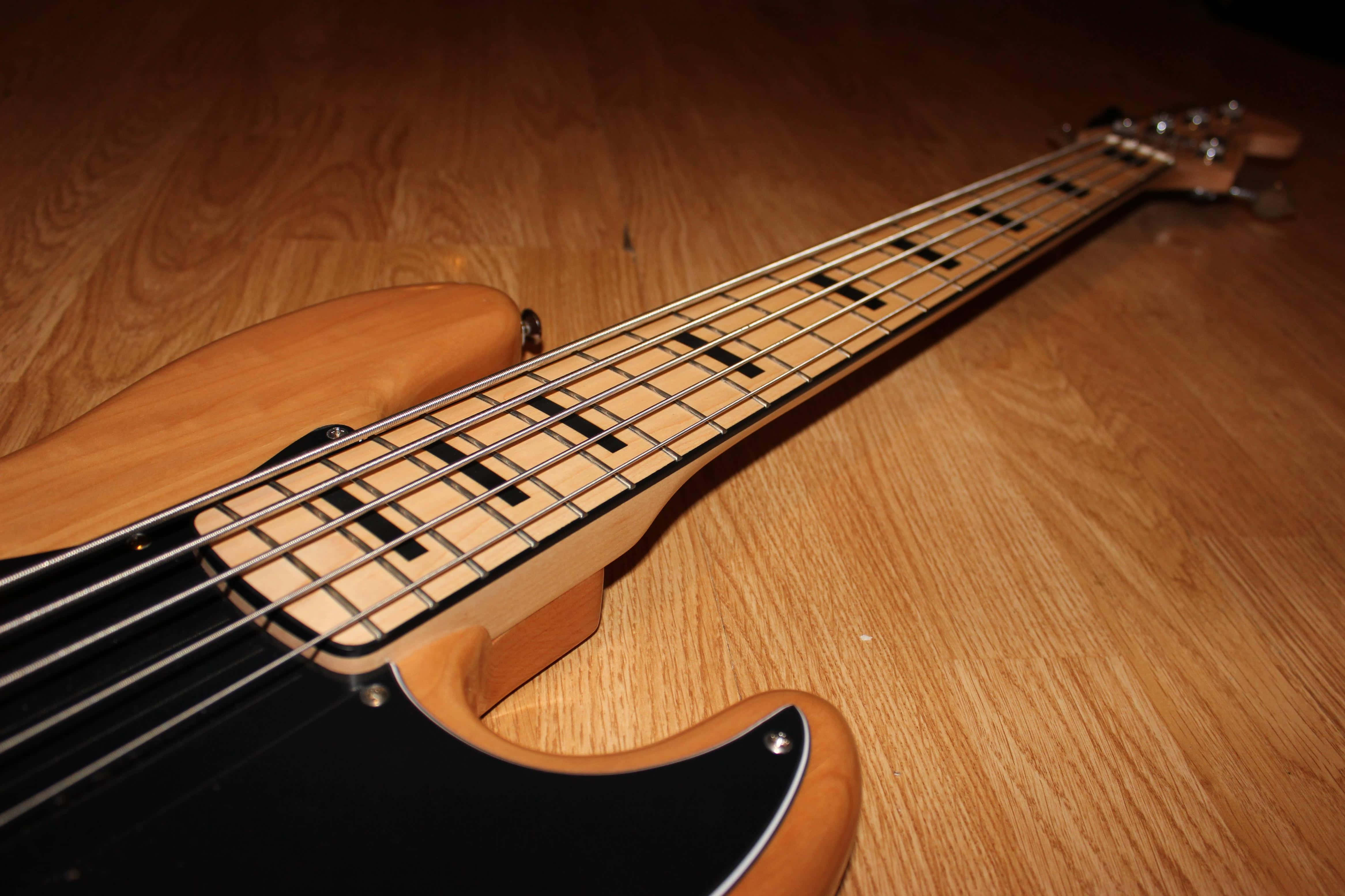 bass guitar, natural wood finish, wooden floor, 4K Desktop Wallpaper