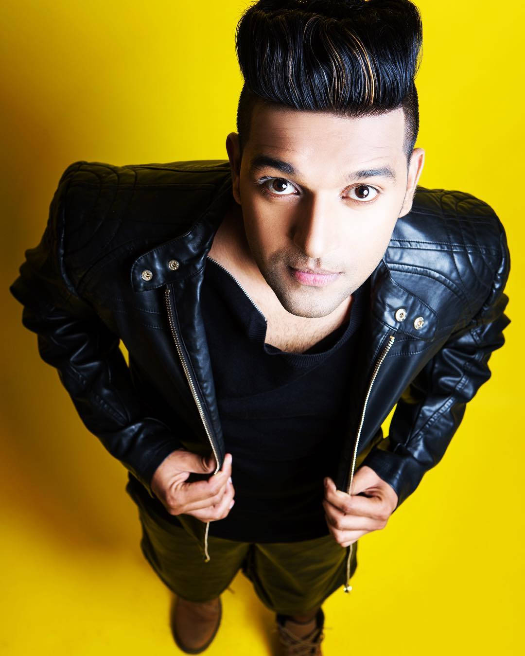 Guru Randhawa, black leather jacket, vibrant yellow background, HD Phone Wallpaper