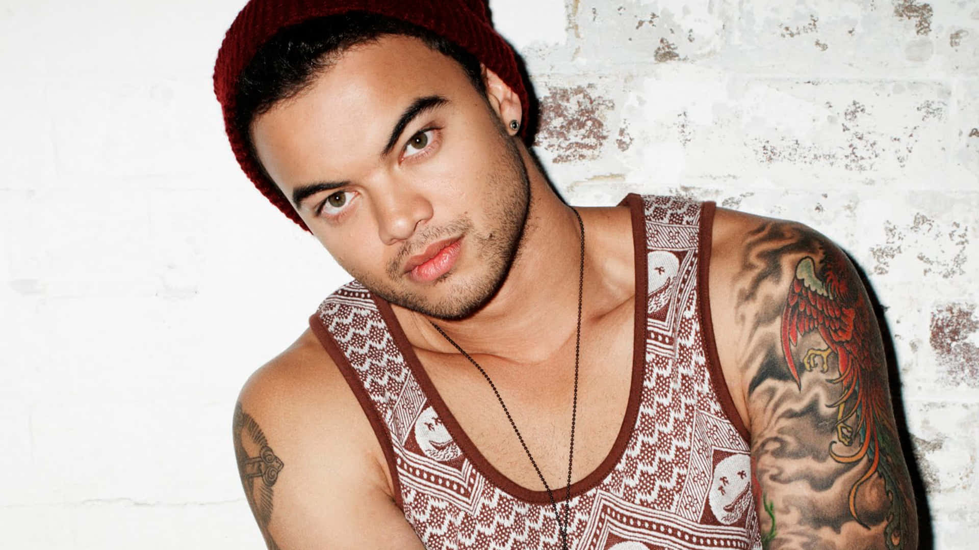 Guy Sebastian, red beanie, white brick wall, Full HD Desktop Wallpaper
