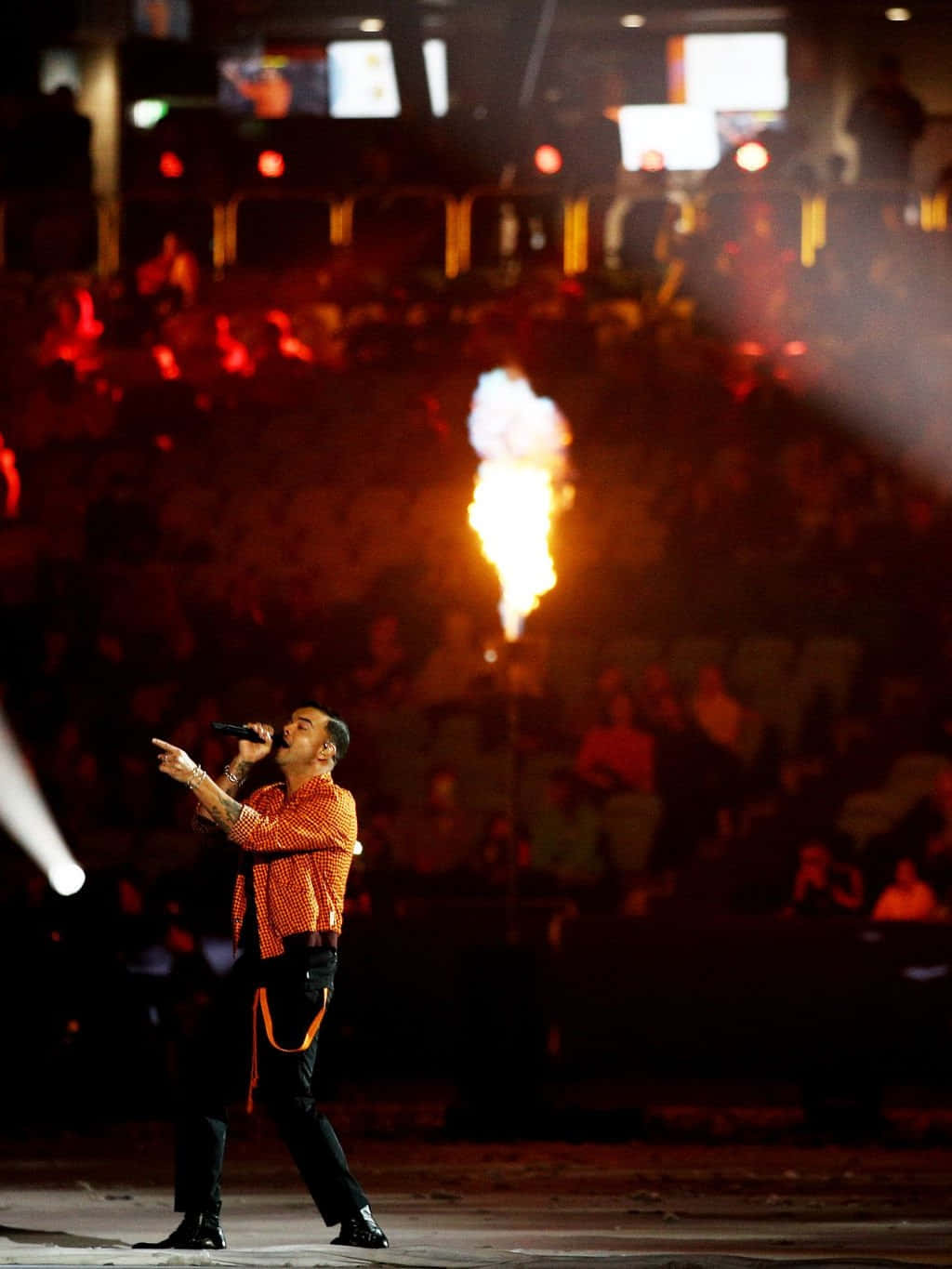 Guy Sebastian, orange shirt, flaming torch, HD Phone Wallpaper
