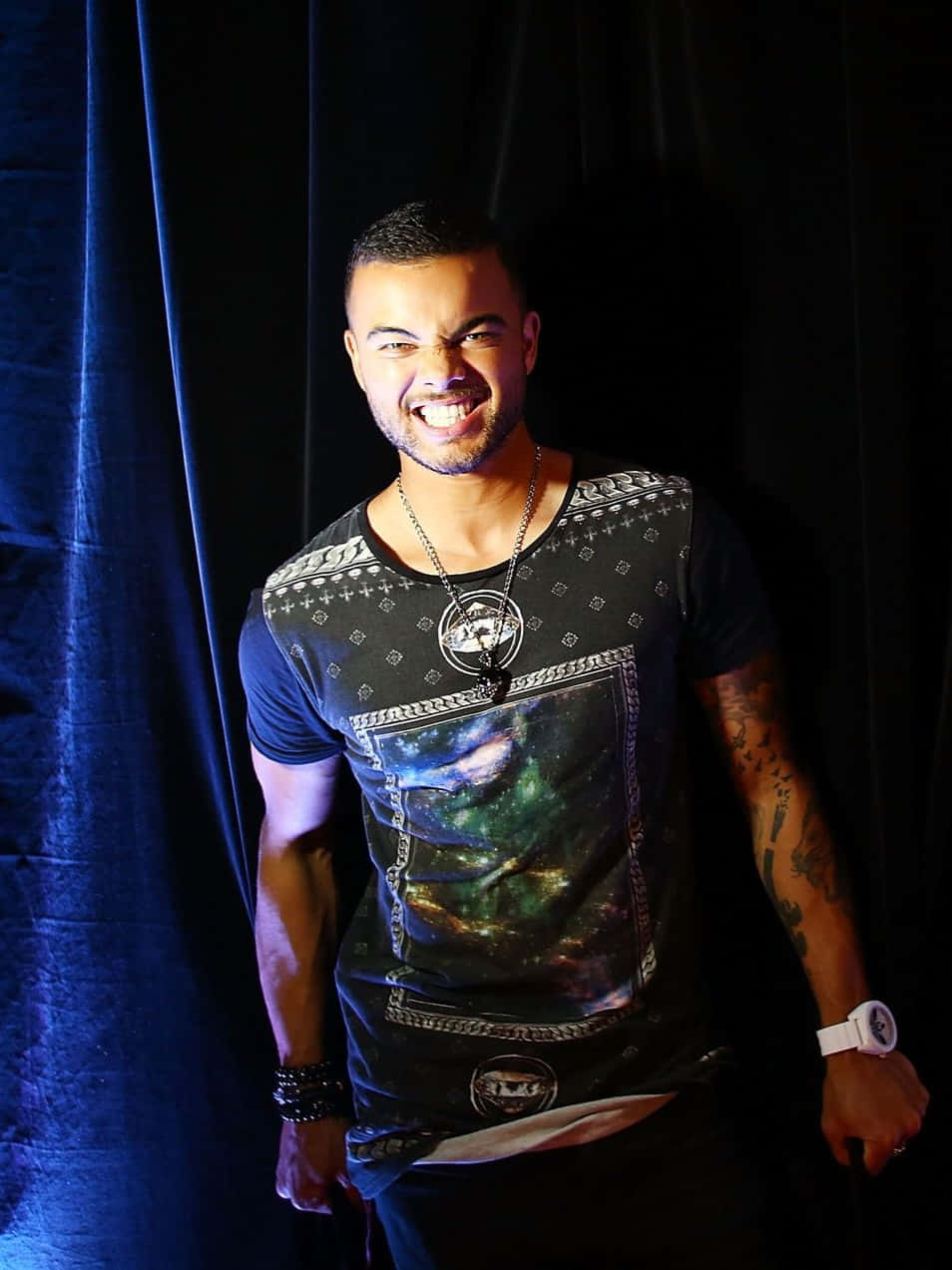 Guy Sebastian, galaxy-print shirt, deep blue velvet curtain, SD Phone Wallpaper