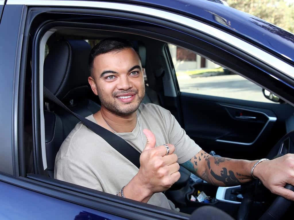 Guy Sebastian, blue car, tattoos, SD Desktop Wallpaper