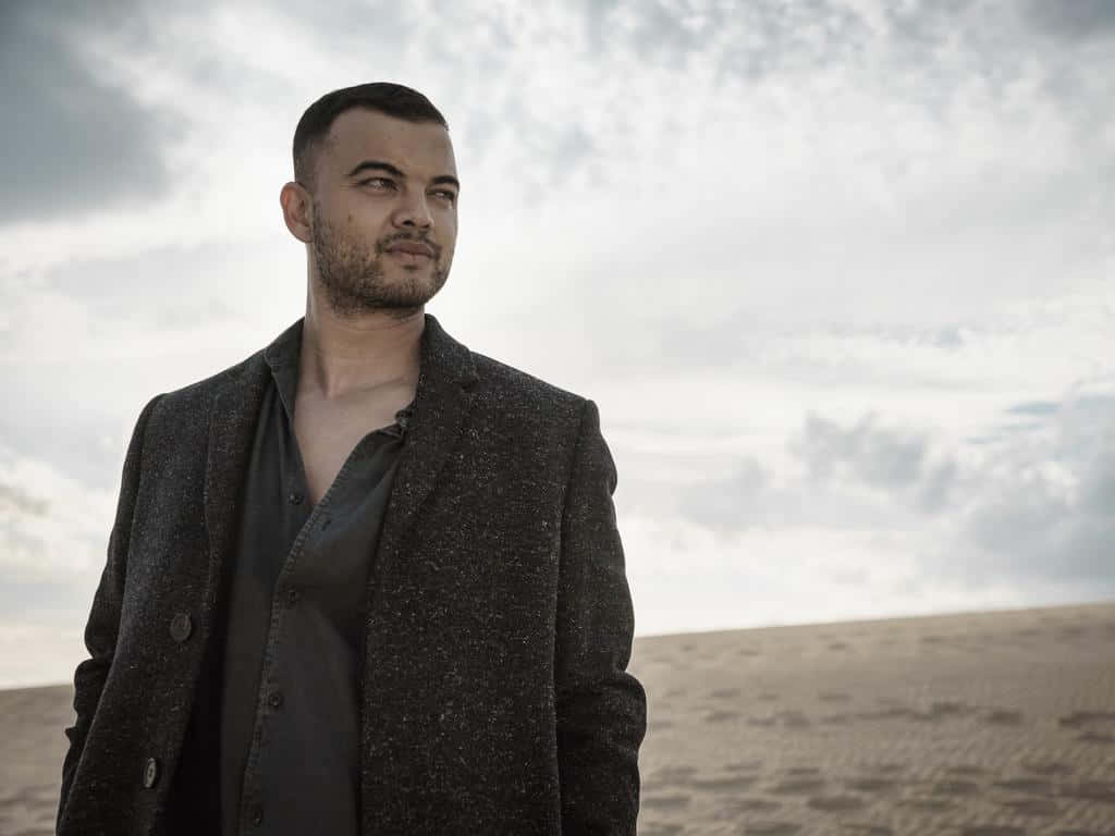 Guy Sebastian, textured dark coat, sandy dune, SD Desktop Wallpaper