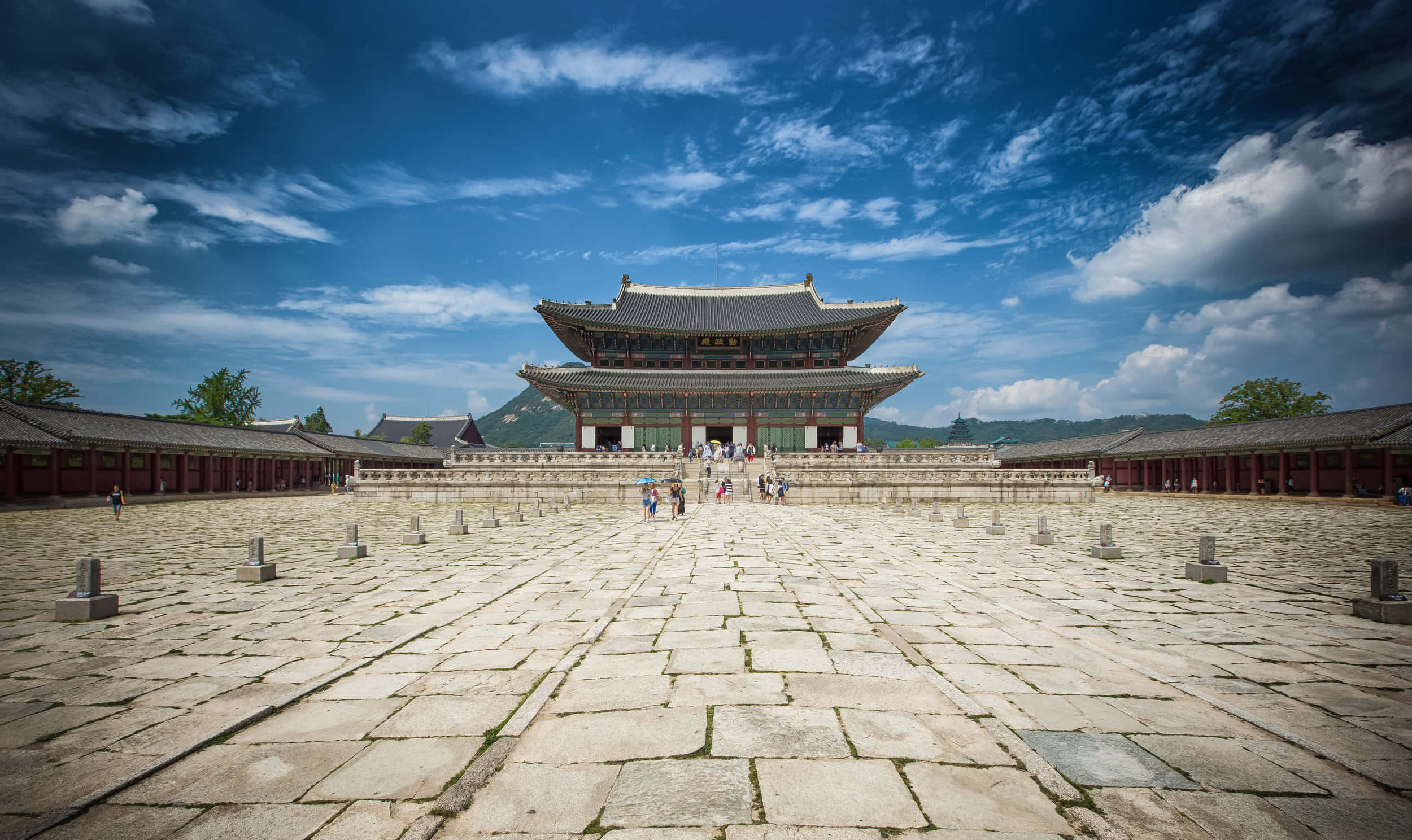 Gyeongbokgung Palace, sweeping stone courtyard, vibrant blue sky, Full HD Desktop Wallpaper