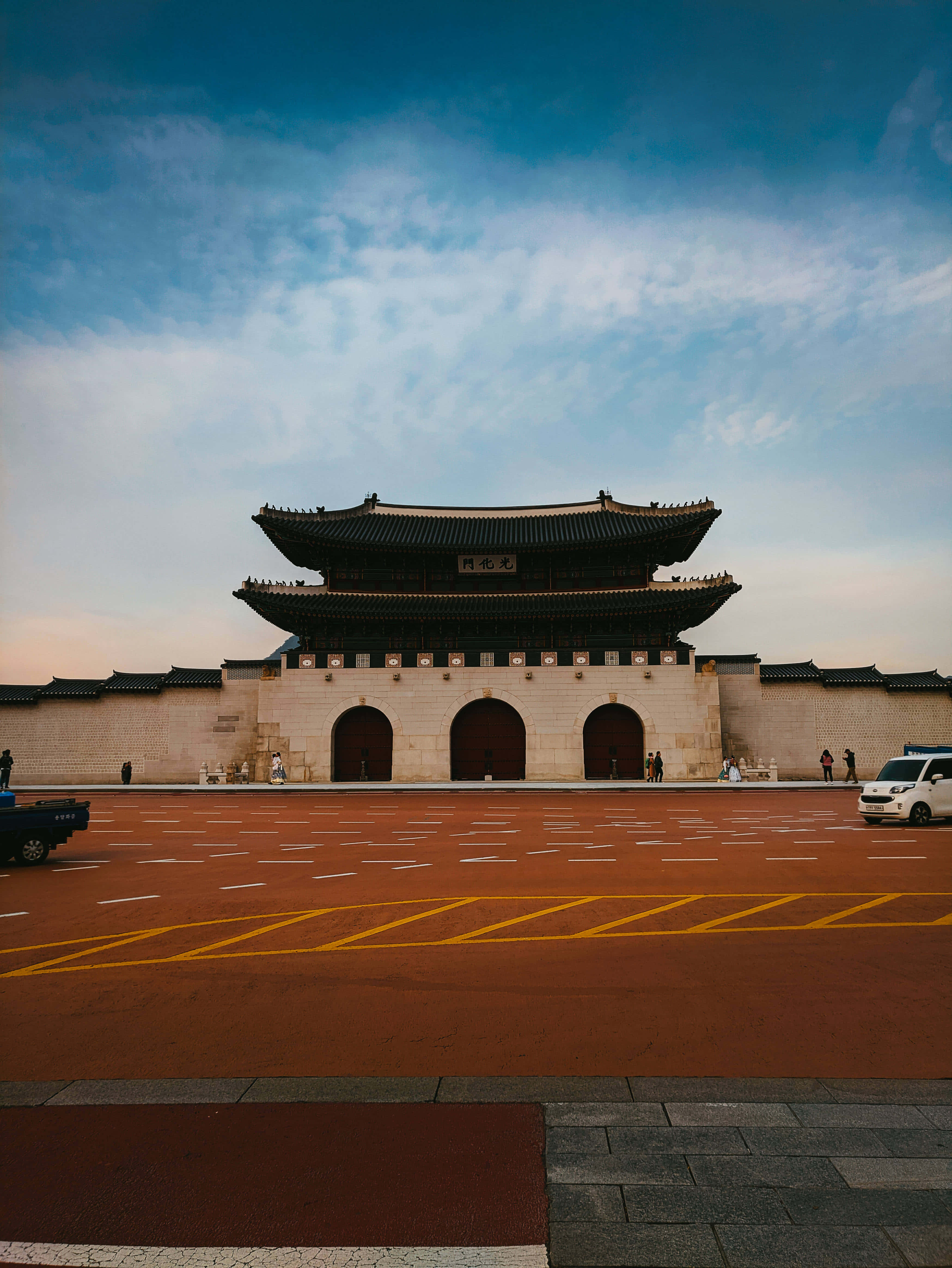 Gyeongbokgung Palace, curved roofs, vast blue sky, 4K Phone Wallpaper