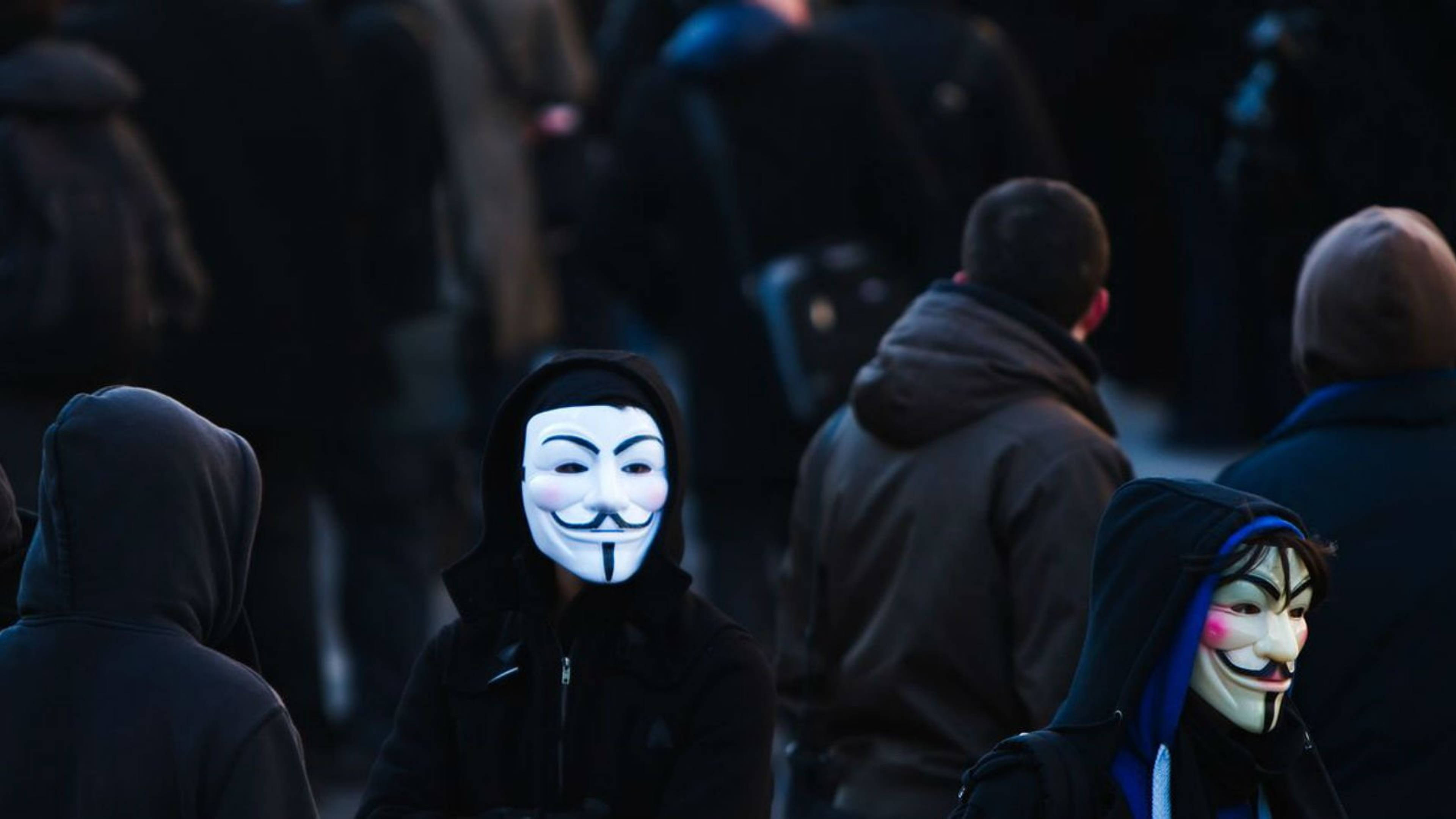 Hacker 4K, black hoodies, glowing Guy Fawkes masks, 4K Desktop Wallpaper