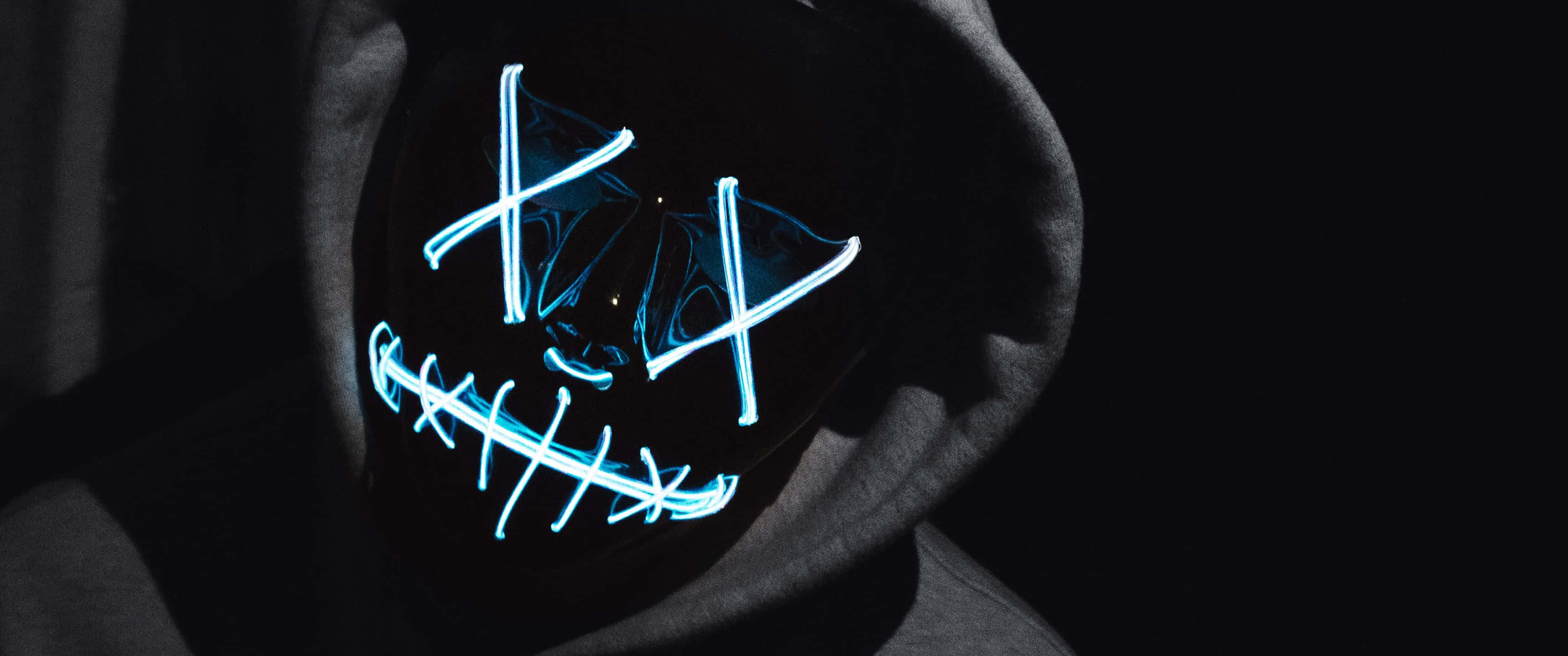 dark web, glowing blue LED mask, stitched smile, 2K Desktop Wallpaper