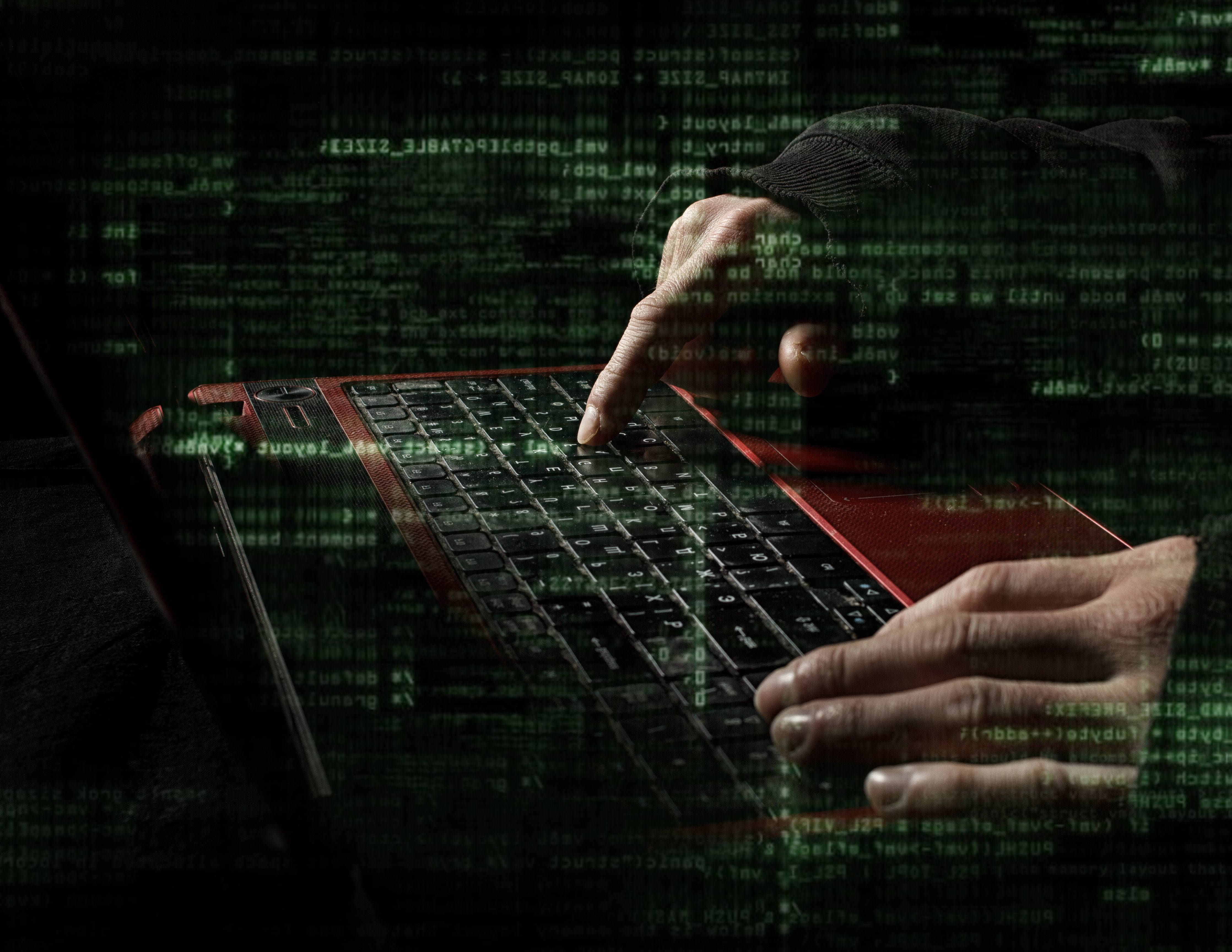 red laptop, green digital code, dark background, 4K Desktop Wallpaper