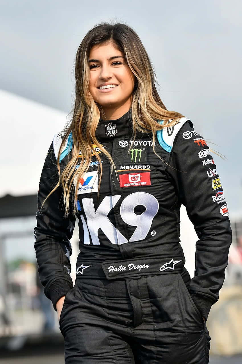 Hailie Deegan, black Toyota racing suit, sponsor logos, SD Phone Wallpaper
