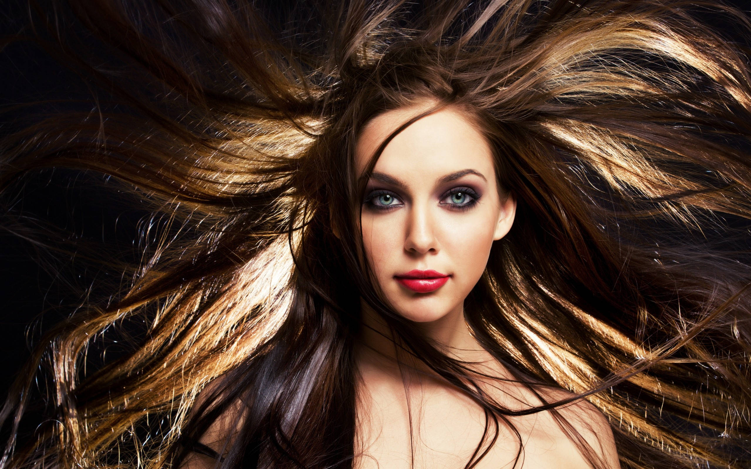 flying brown hair, flowing brown hair, striking blue eyes, 2K Desktop Wallpaper