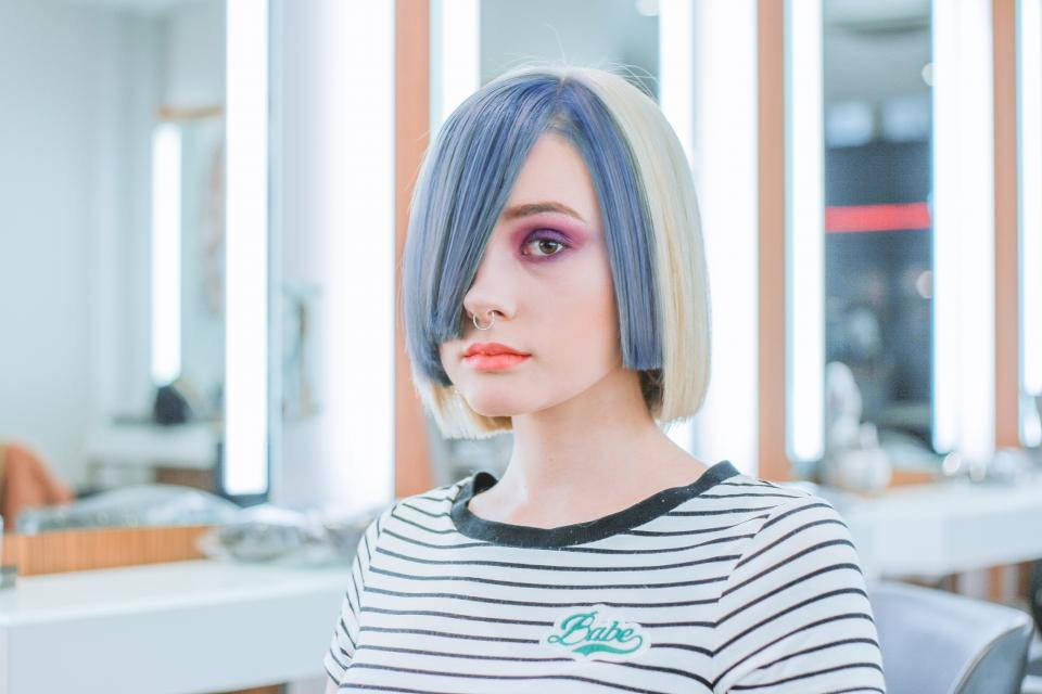 blue and blonde bob haircut, bold purple eyeshadow, bright salon chair, SD Desktop Wallpaper