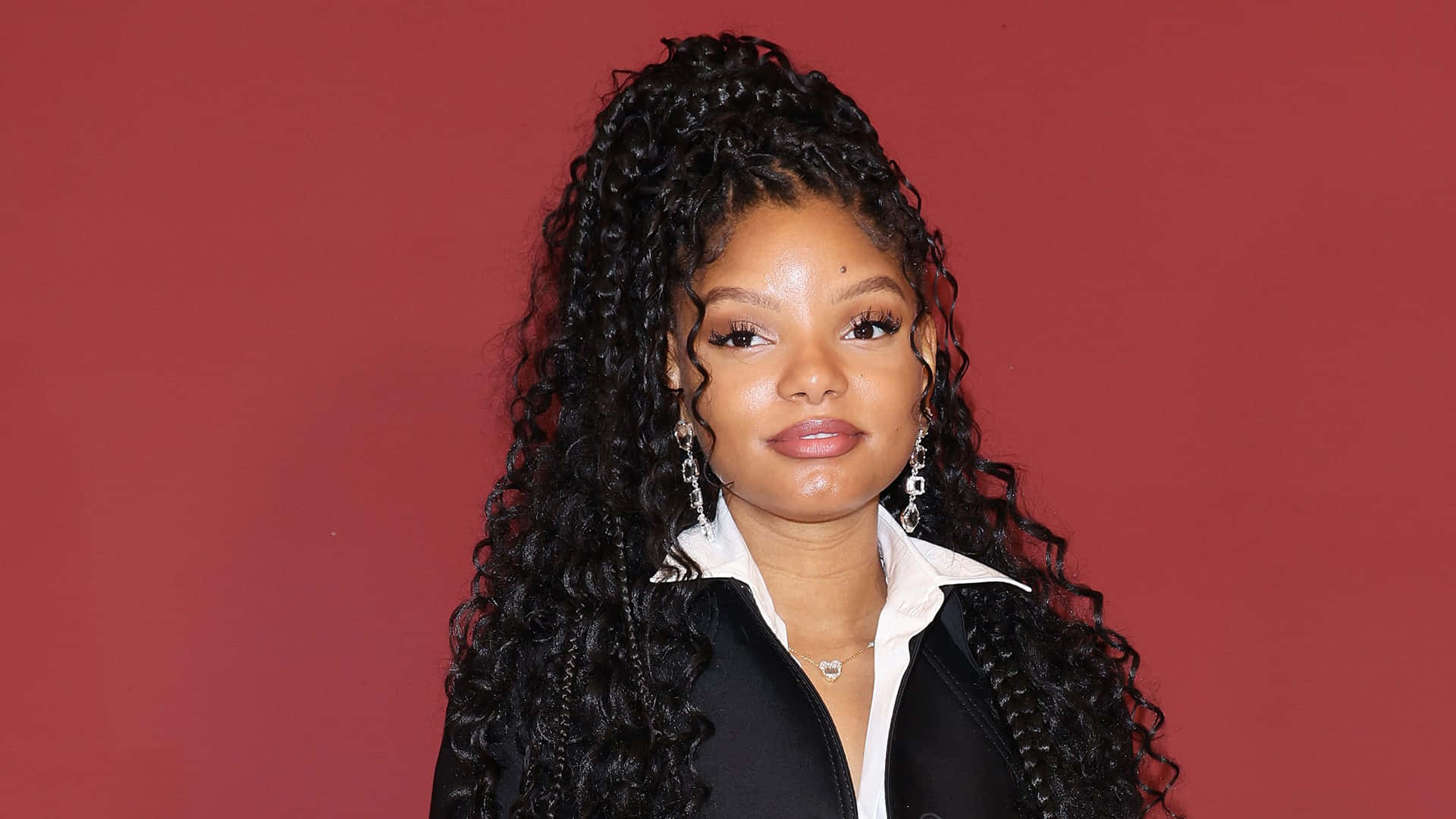 Halle Bailey, red background, voluminous curly hair, Full HD Desktop Wallpaper
