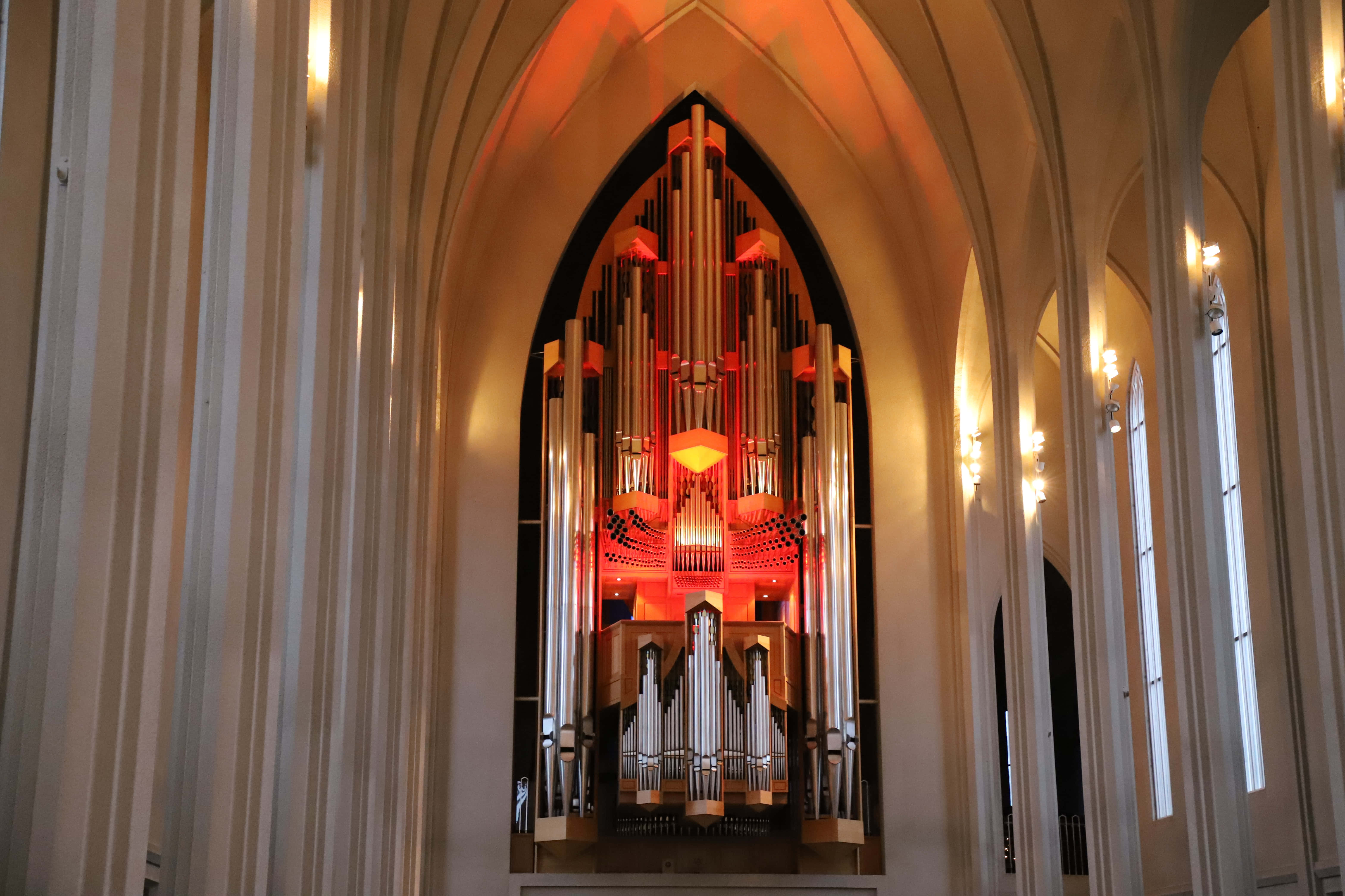 Hallgrimskirkja, cathedral organ, warm red light, 5K Desktop Wallpaper