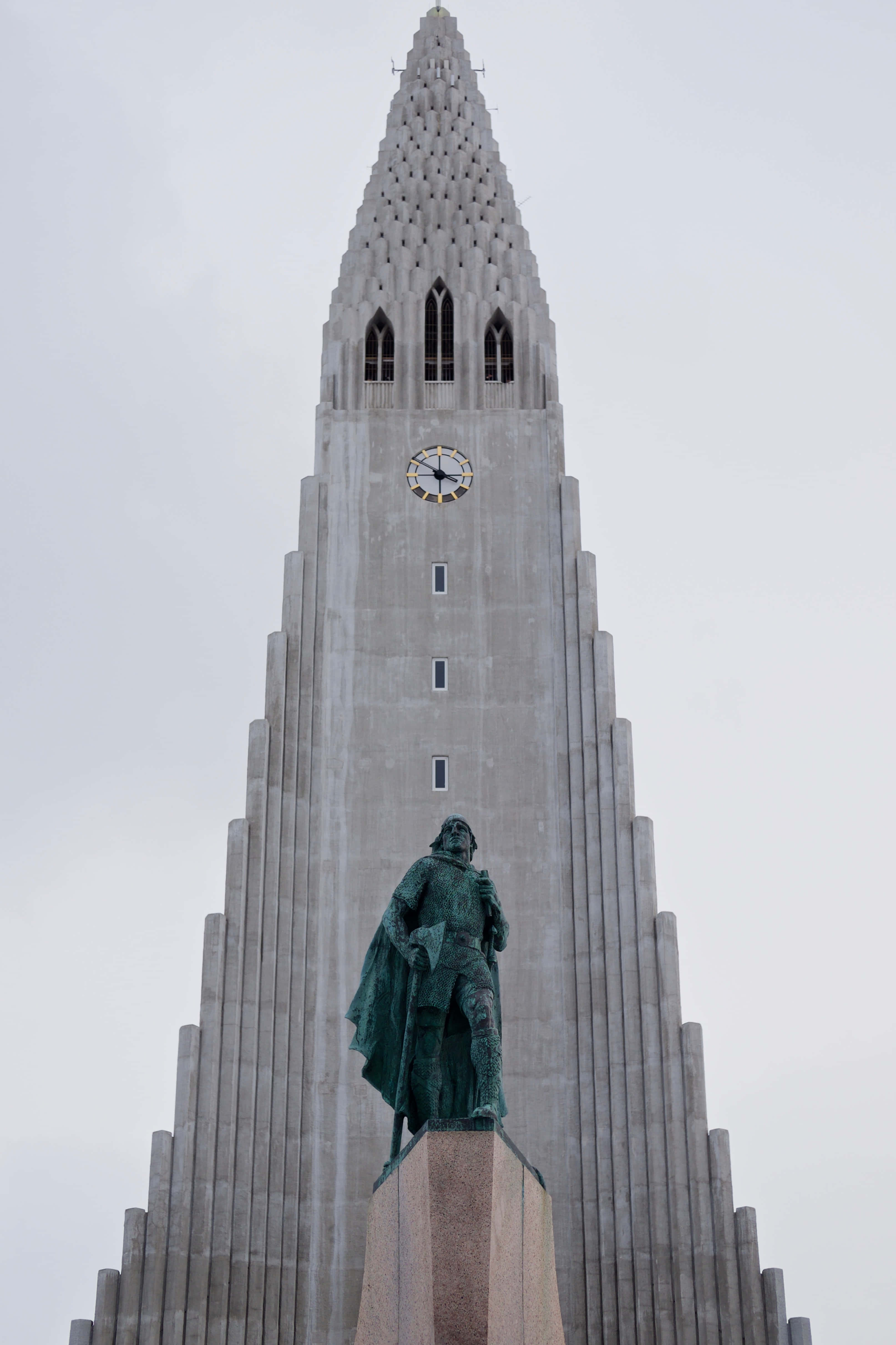 Hallgrimskirkja, statue of Leif Eriksson, concrete spire, 4K Phone Wallpaper