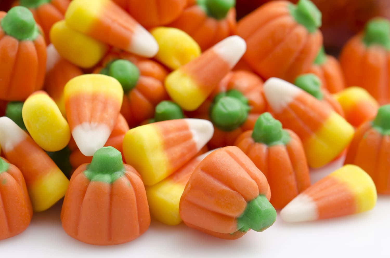 candy corn, pumpkin-shaped gummies, vibrant autumn hues, HD Desktop Wallpaper