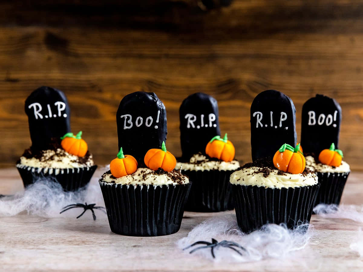Halloween Cupcakes, orange and black fondant decorations, black tombstone toppers, SD Desktop Wallpaper