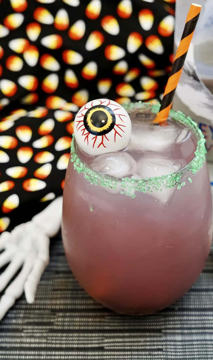Spooky Halloween Punch, floating witch hand, pink Halloween cocktail, SD Phone Wallpaper