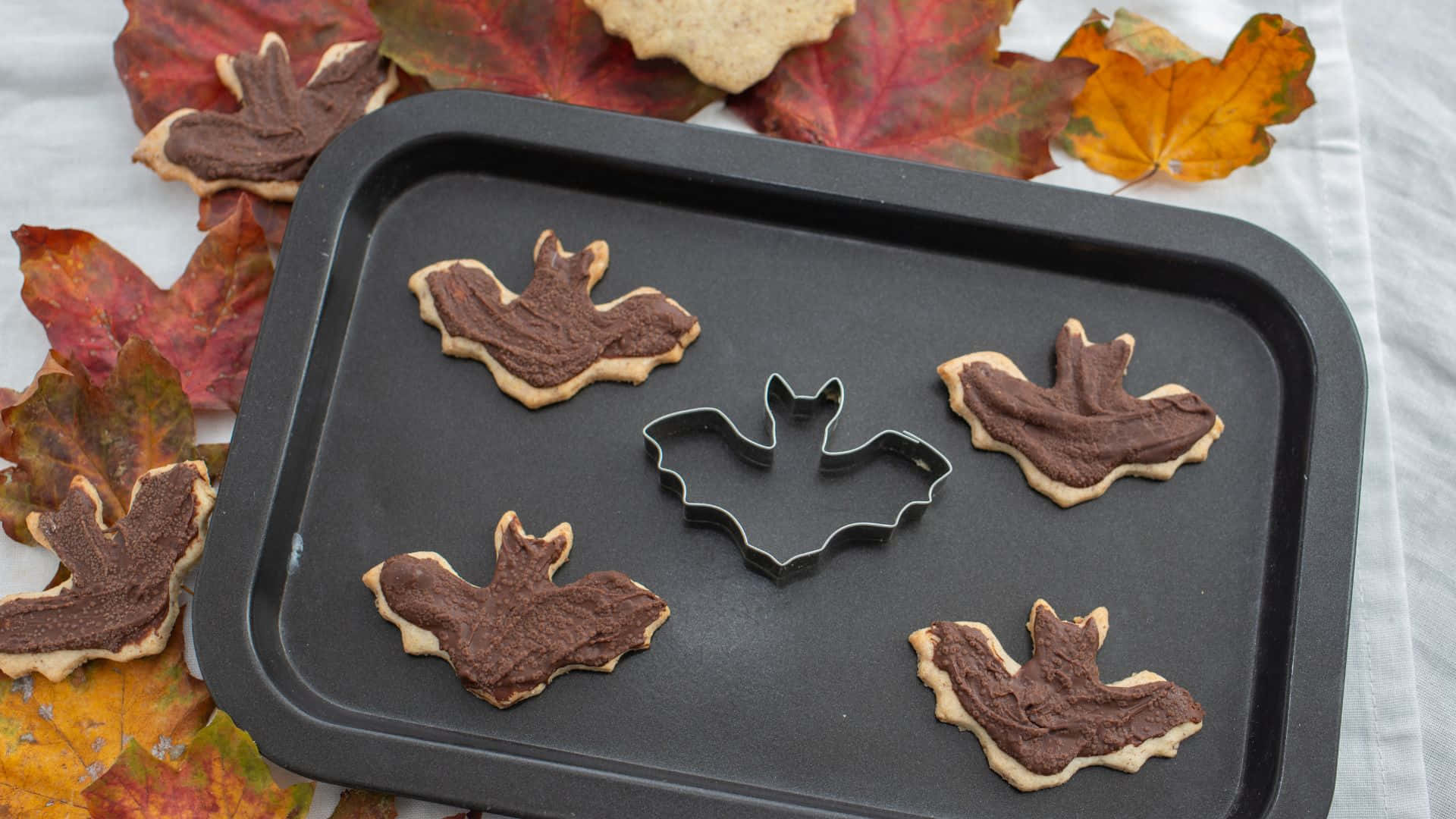 Halloween cookie cutters, bat-shaped sugar cookies, chocolate icing, Full HD Desktop Wallpaper