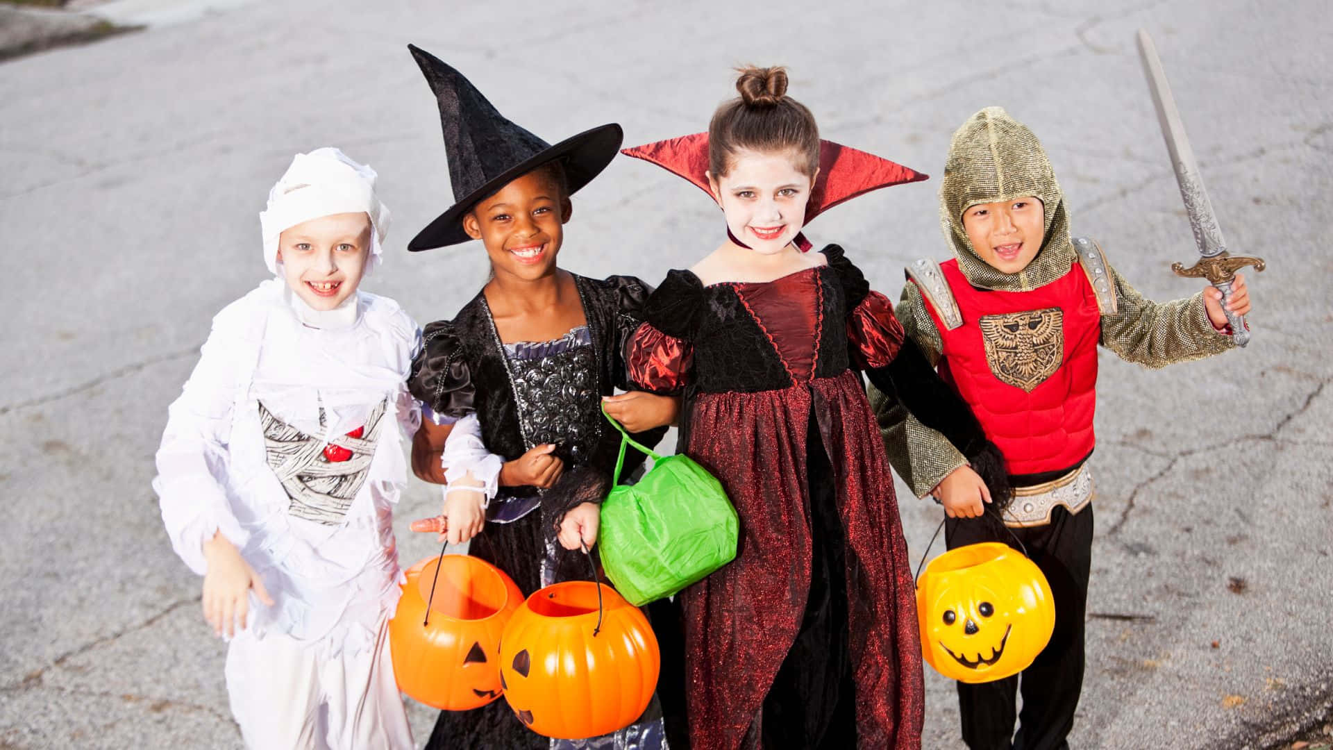 Halloween costumes, pumpkin buckets, paved street, Full HD Desktop Wallpaper