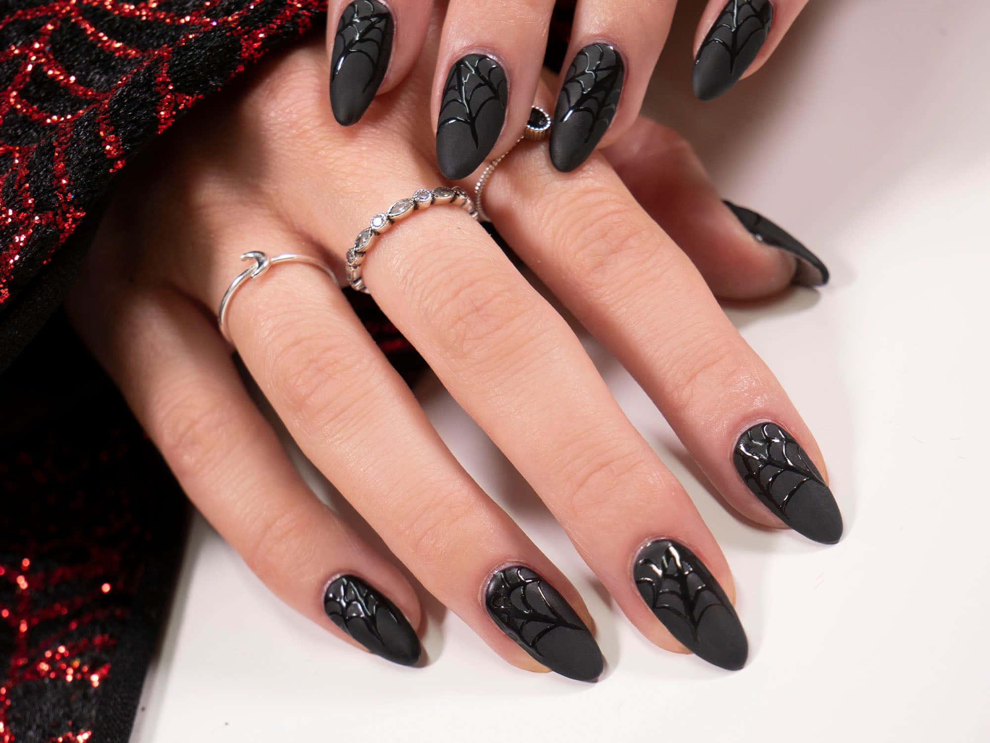 matte black spiderweb nail art, silver rings, red glitter fabric, Full HD Desktop Wallpaper