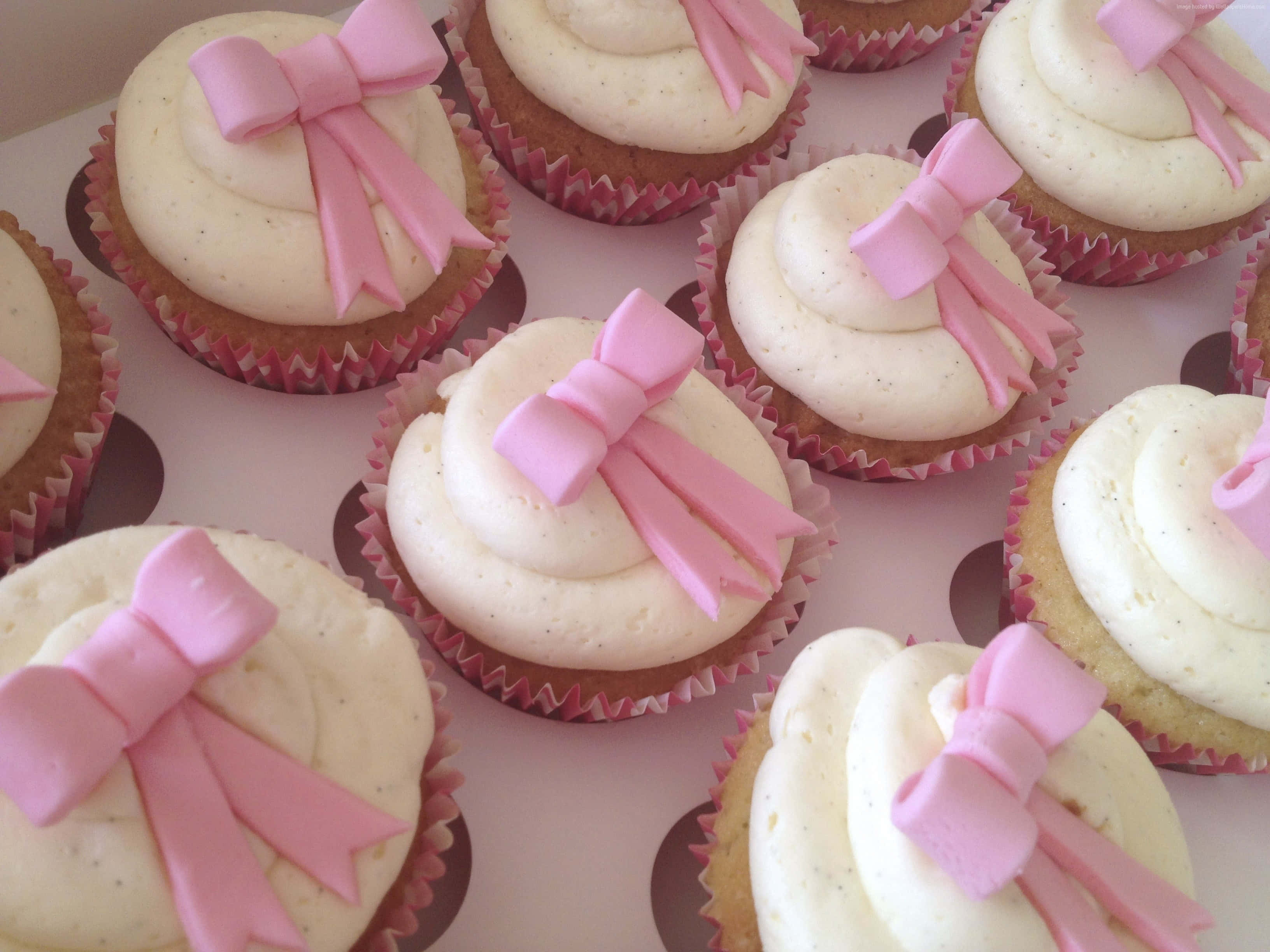 pink cupcakes, creamy white frosting, pink fondant bows, 2K Desktop Wallpaper
