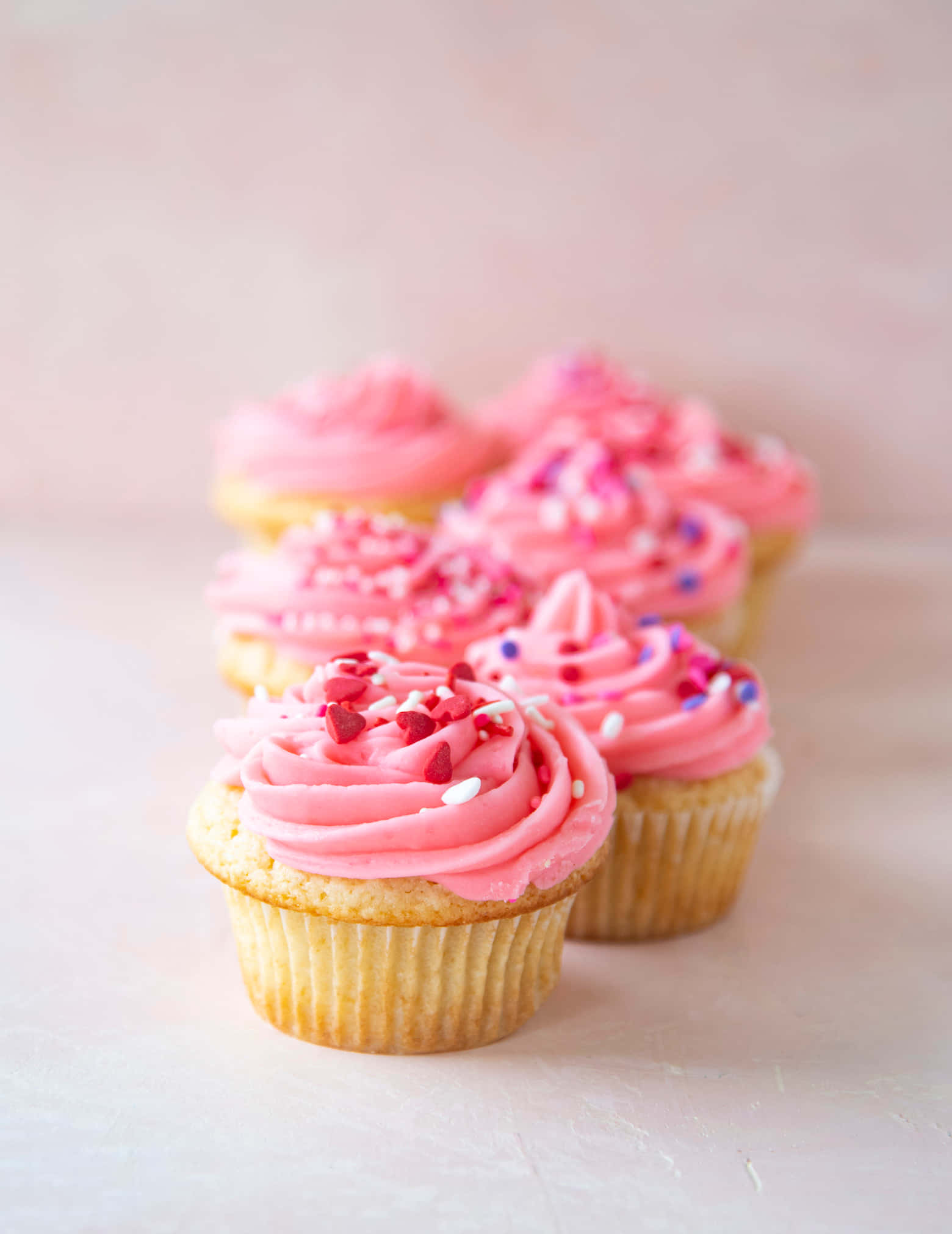 pink cupcakes, heart sprinkles, soft pink surface, Full HD Phone Wallpaper