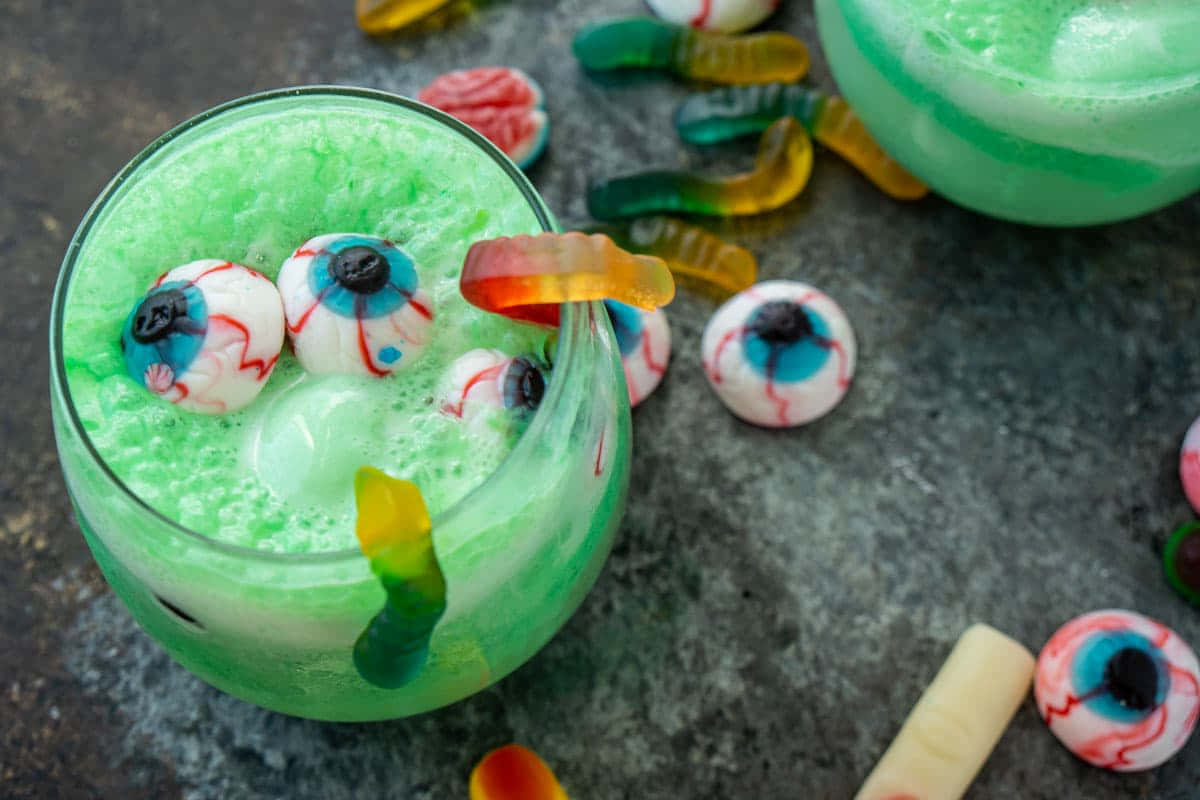 Halloween Drinks, vibrant green frothy drink, gummy eyeballs, SD Desktop Wallpaper