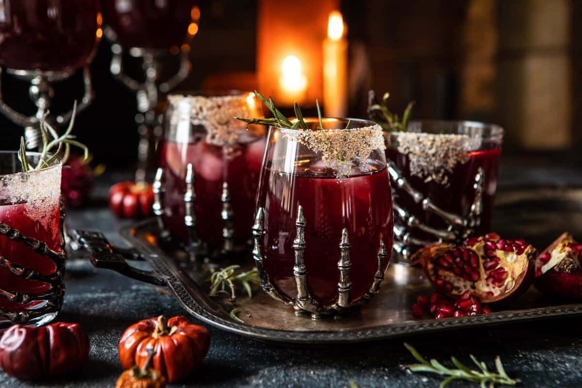 Halloween cocktails, skeleton-hand glasses, dark red pomegranate cocktails, SD Desktop Wallpaper