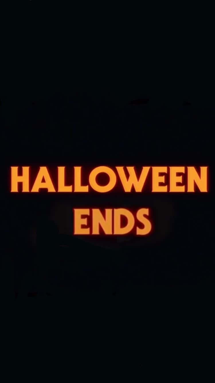 Halloween Ends, orange glowing text, pitch black background, HD Phone Wallpaper