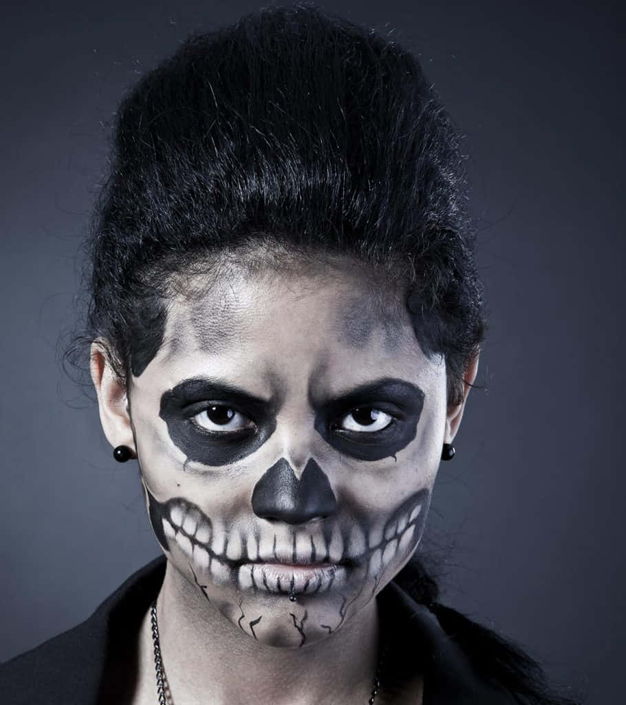 Halloween face paint, skull makeup, dark gray background, SD Phone Wallpaper